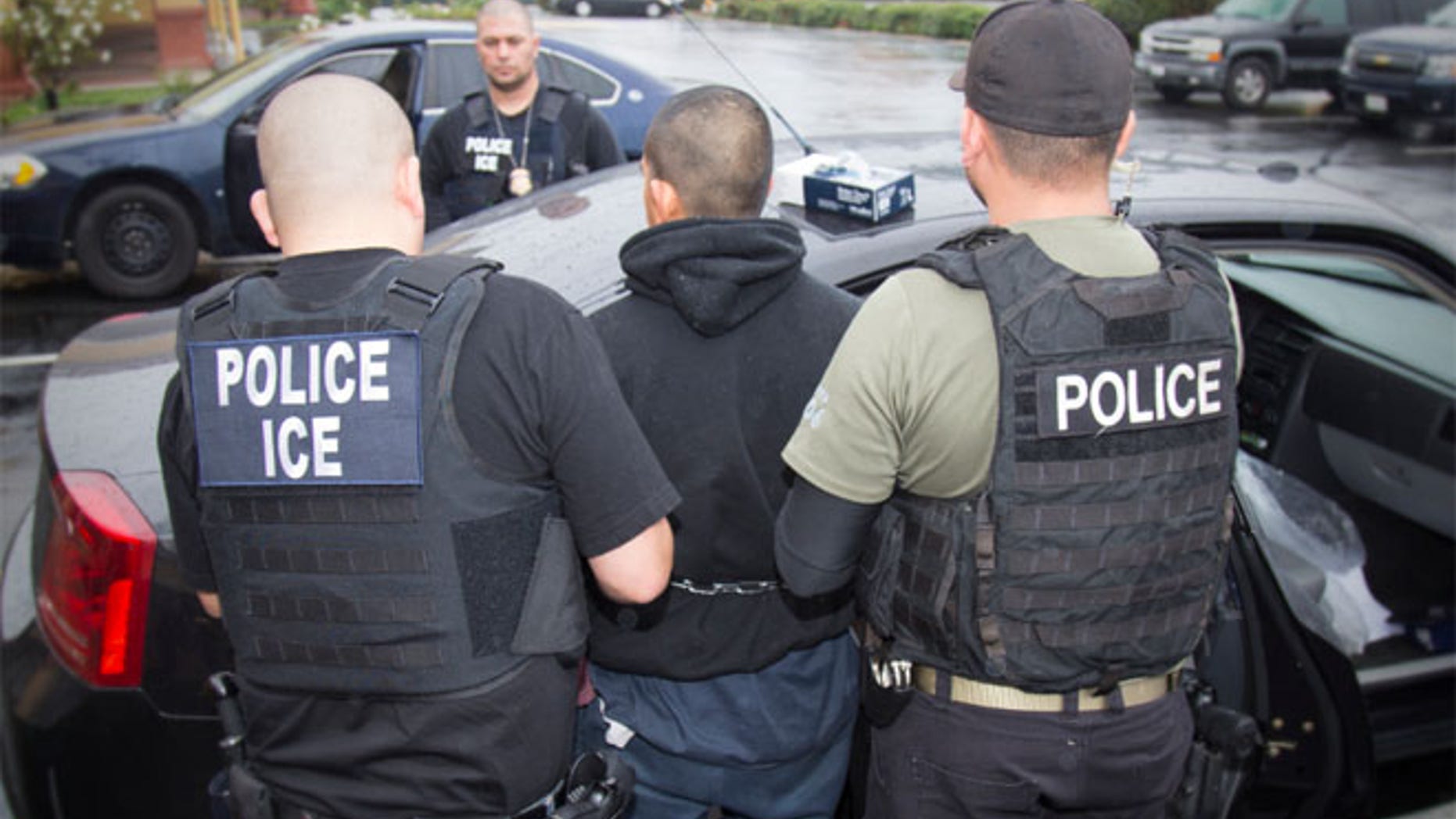 FILE 2017: A photo released by ICE shows foreign nationals being arrested this week.