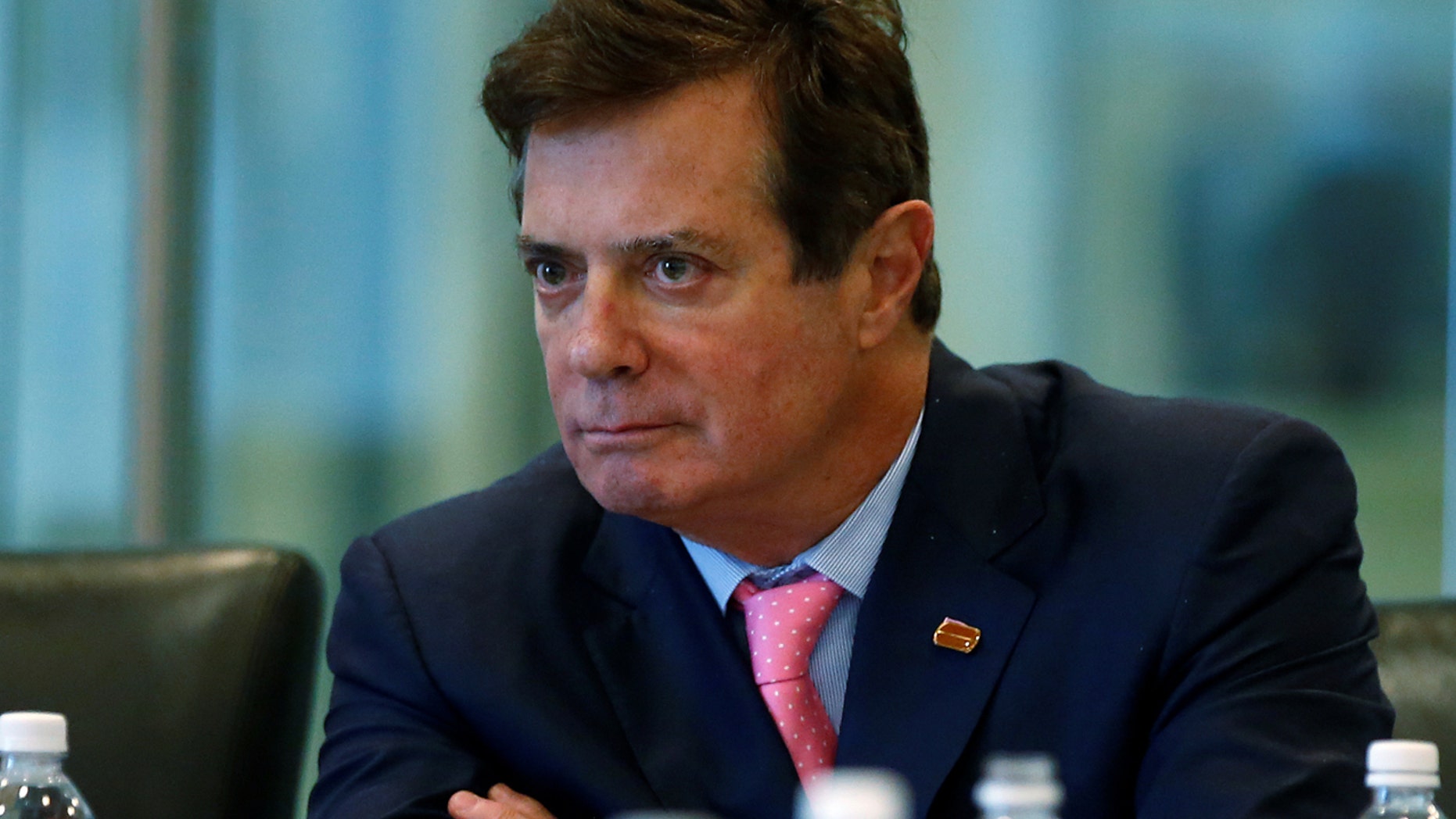 FILE: Paul Manafort of Republican presidential nominee Donald Trump's staff listens during a round table discussion on security at Trump Tower in the Manhattan.