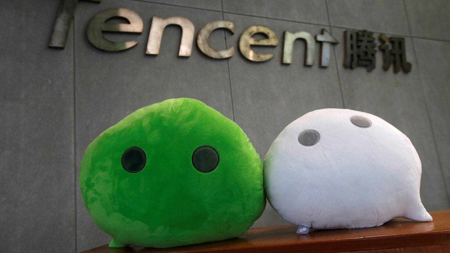 Popular Chinese messaging app WeChat has apologized after a software glitch used the N-word in a translation for "black foreigner." (REUTERS/Bobby Yip)