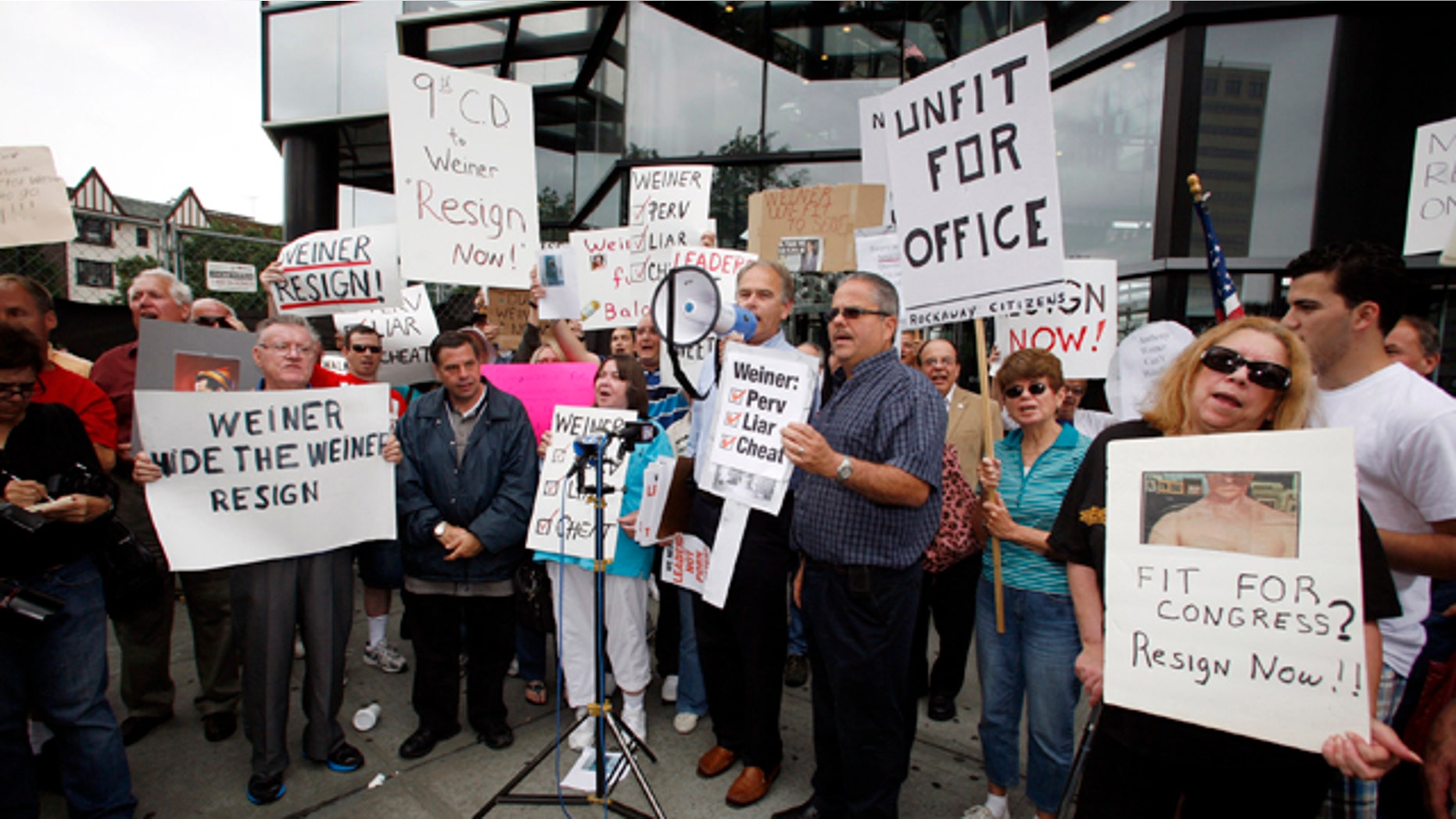 June 12: Queens residents hold a rally calling for the resignation of US Congressman Anthony Weiner D-NY while the Congressman is presumed to be in a rehab facility.