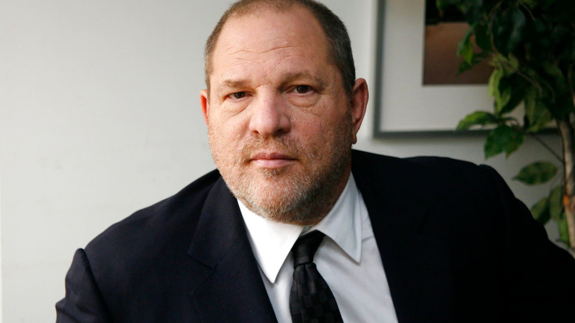 FILE - In this Nov. 23, 2011 file photo, producer Harvey Weinstein, co-chairman of The Weinstein Company, appears during an interview in New York. Weinstein faces multiple allegations of sexual abuse and harassment from some of the biggest names in Hollywood. (AP Photo/John Carucci, File)