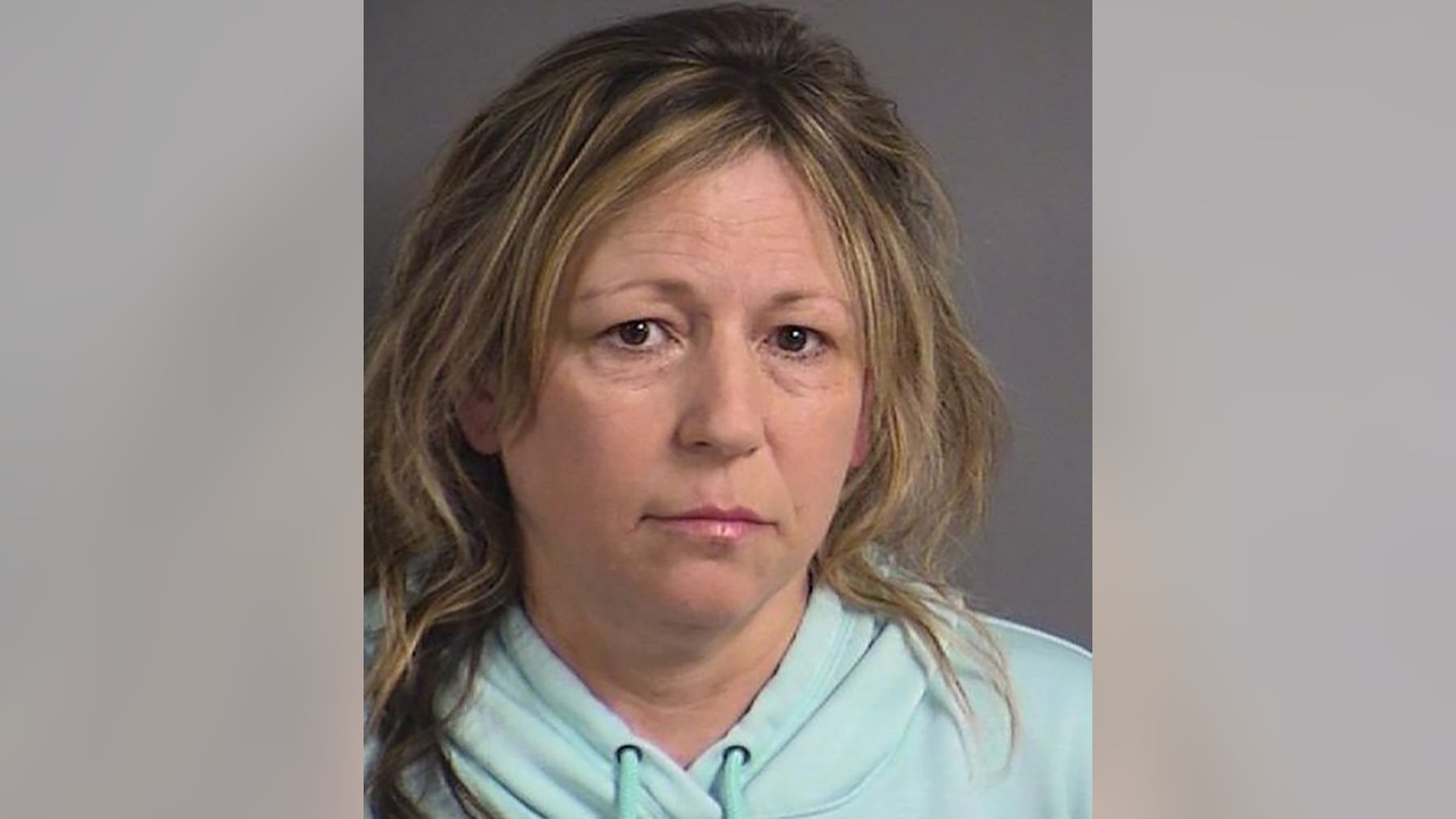 Authorities say Wendy Young, 49, consumed about a dozen beers before an infant in her care was found unresponsive and died in a hospital.