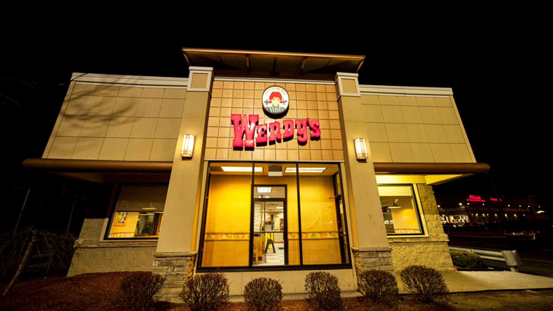New York City, NY, USA - December 17, 2014: View of Wendy's fast food restaurant in Rego Park / Forest Hills, Queens. On Metropolitan Ave.