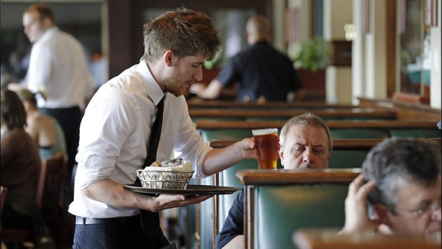 Americans are spending more money dining out than on groceries.