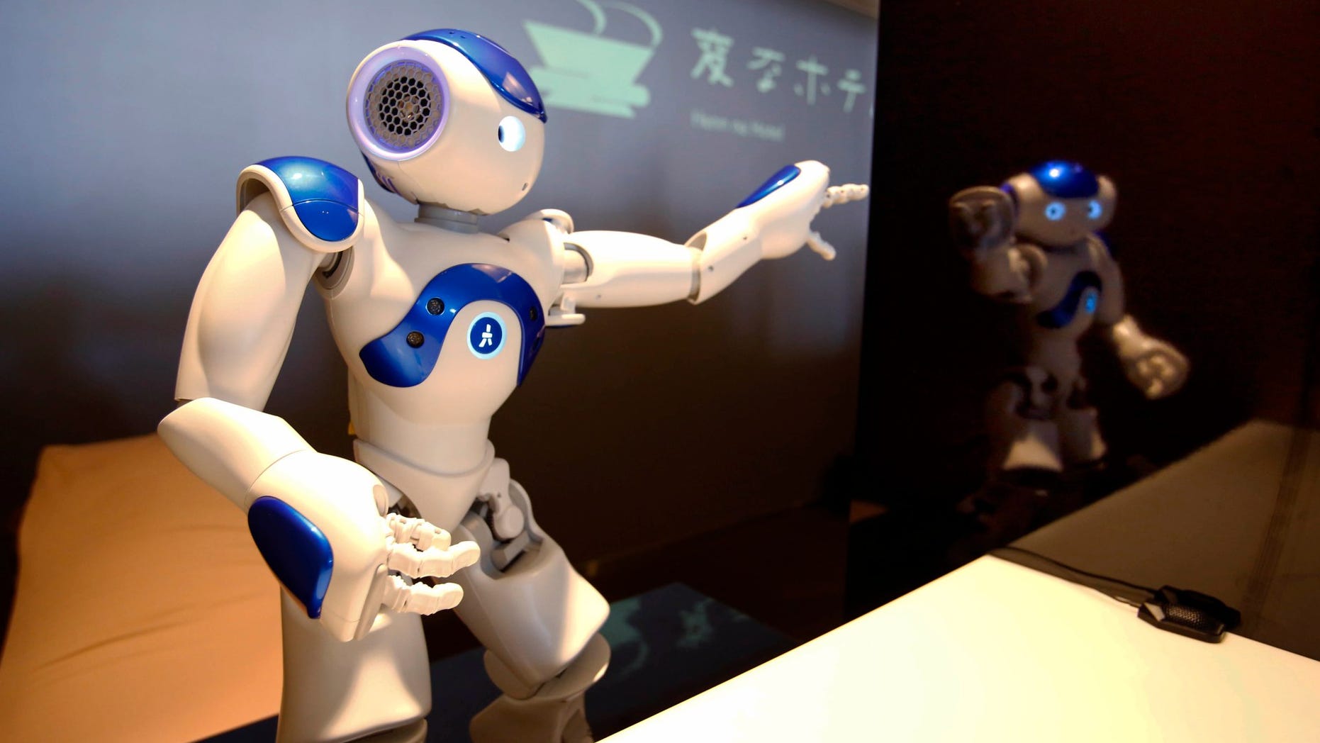 A receptionist robot performs during a demonstration for the media at the Henn na Hotel or Weird Hotel, in Sasebo, southwestern Japan on July 15, 2015.