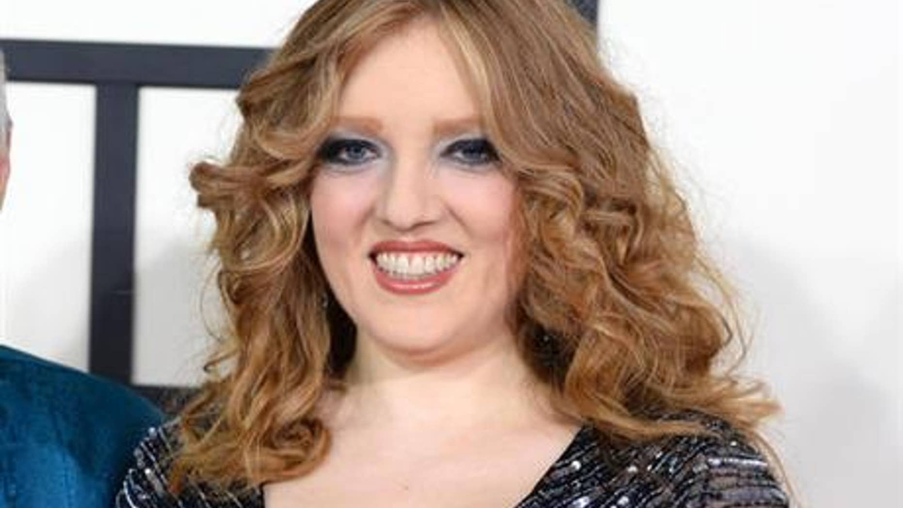 Violinist Rachel Barton appears at the 56th annual Grammy Awards at Staples Center in Los Angeles. Pine says an American Airlines flight attendant and captain would not allow her violin as a carry-on from Chicago to Albuquerque, N.M. She says federal regulations and the airline’s own policy specifically permit violins as carry-ons.