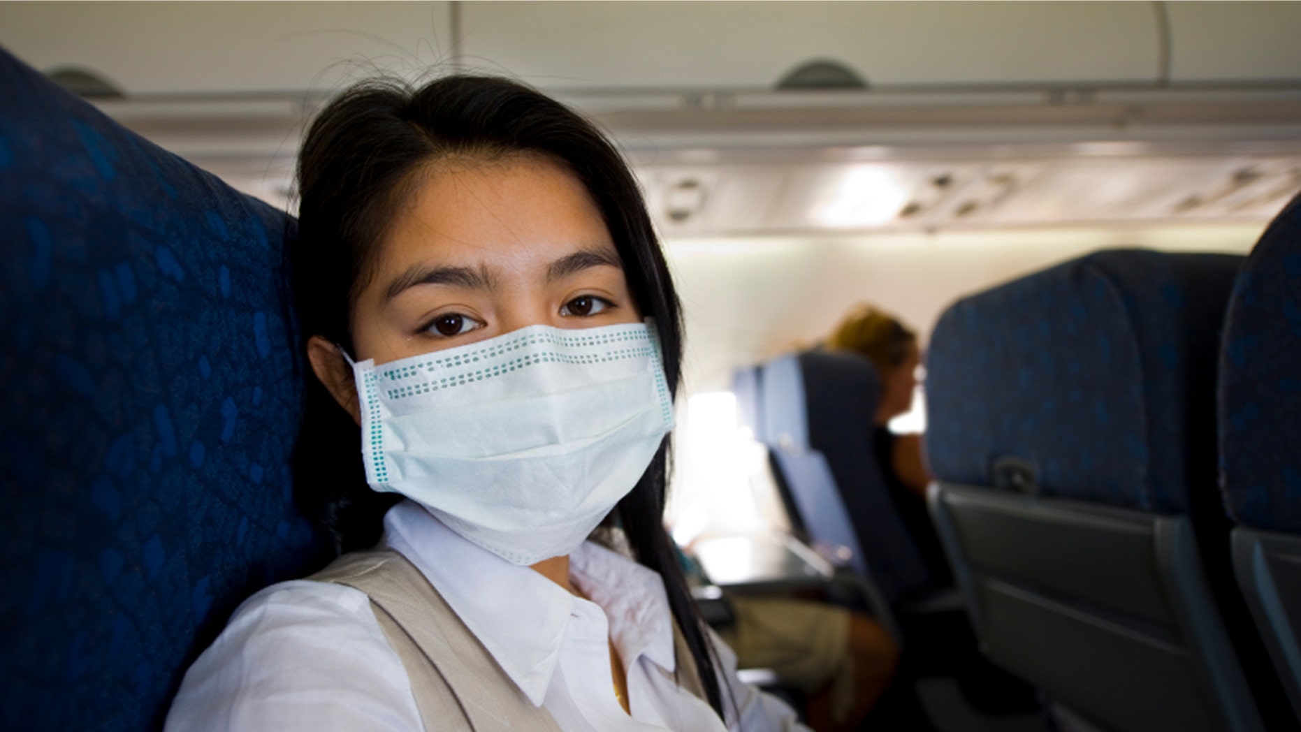 Wearing a mask may seem extreme but travelers encounter tons of germs while flying.