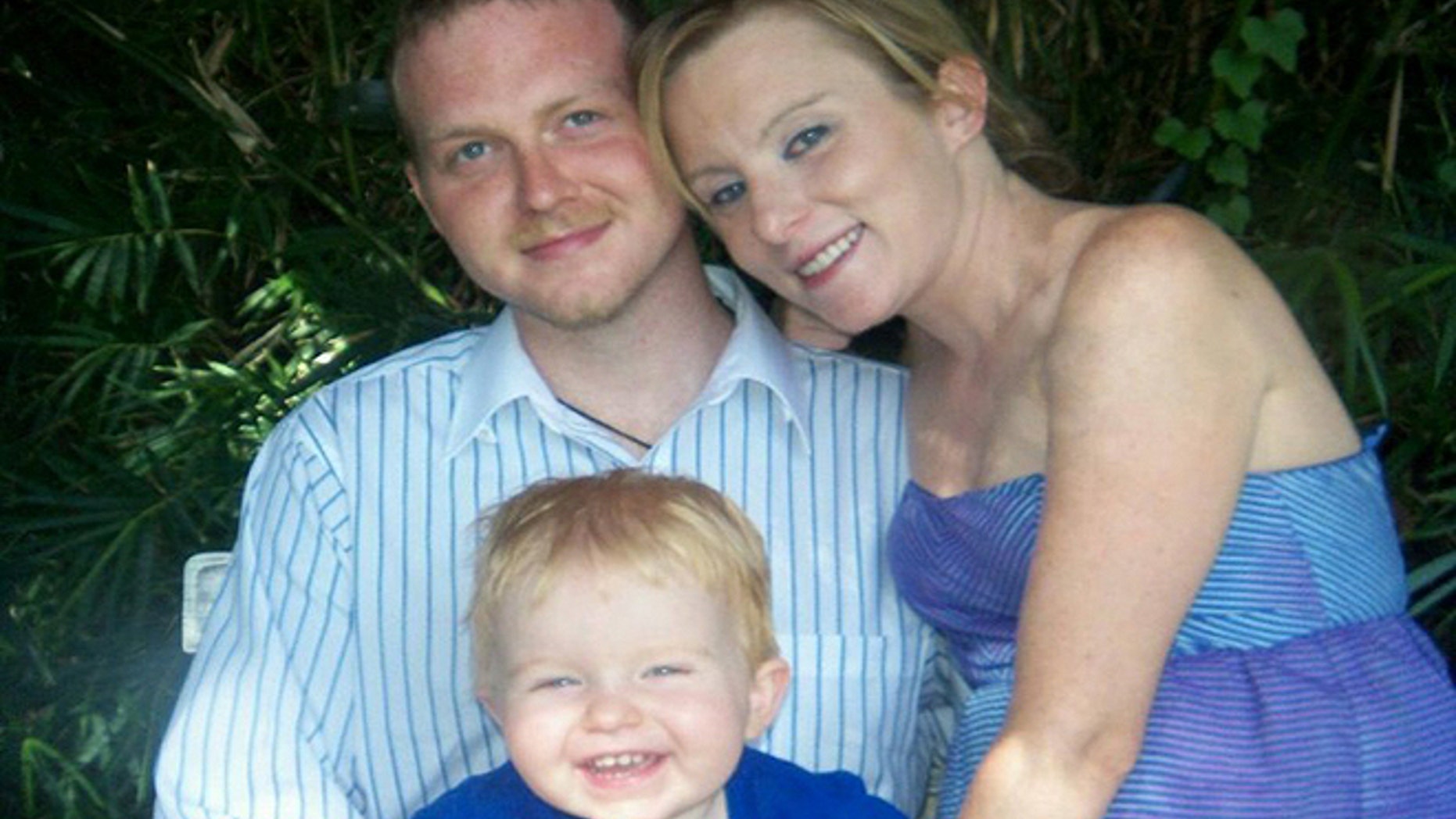 Byron Wilson, pictured with his wife and son, is being hailed as a Good Samaritan for engaging a killer during a weekend rampage.