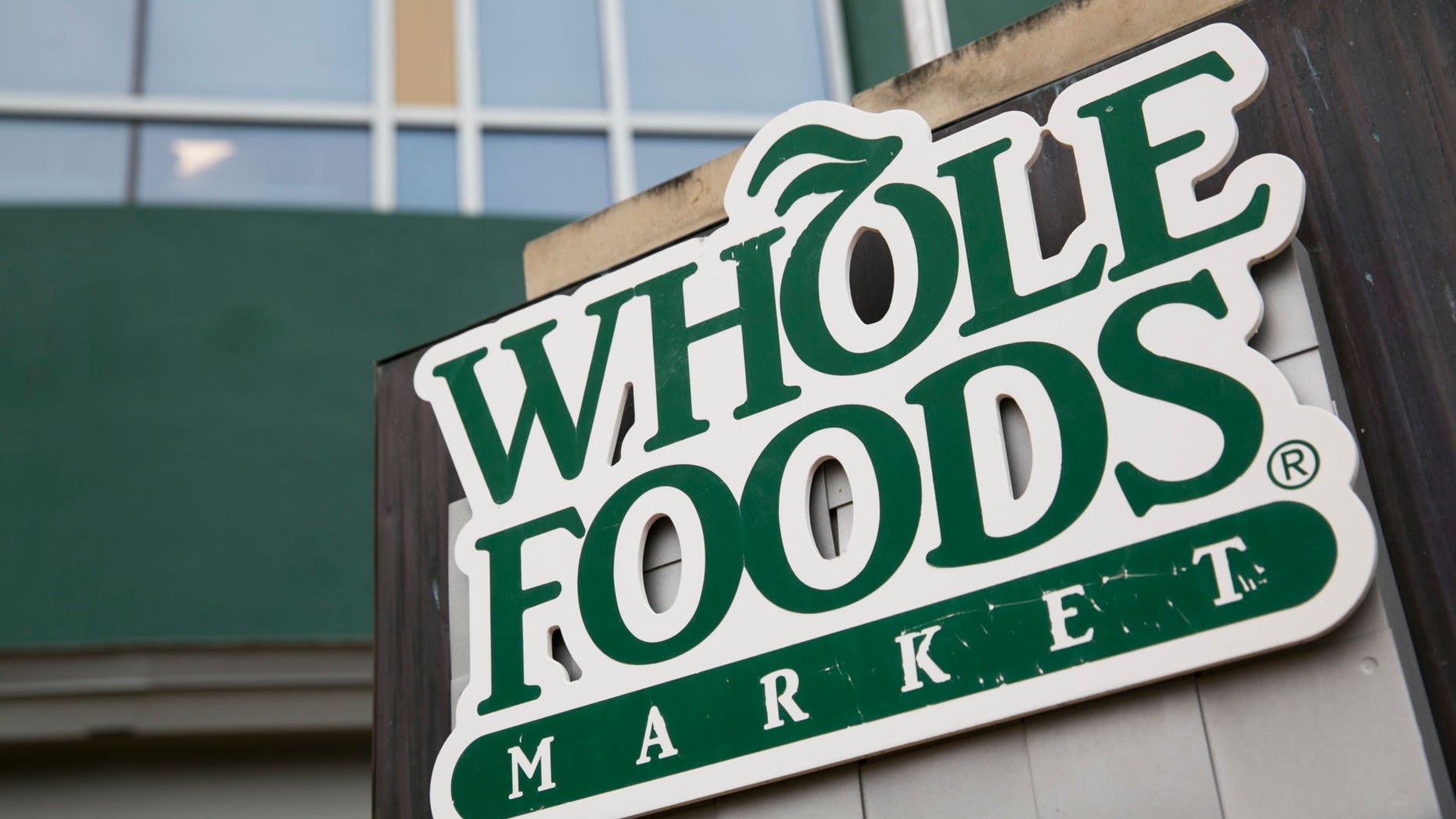 A Whole Foods store fired a security team that banned a 70-year-old customer. Photo by Kristoffer Tripplaar (Sipa via AP Images)