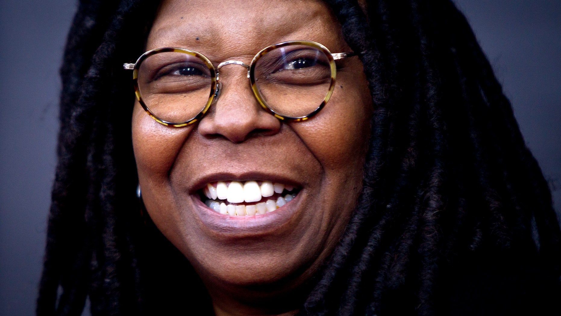 TV personality Whoopi Goldberg arrives for the premiere of "The Imitation Game" in New York, November 17, 2014. REUTERS/Carlo Allegri (UNITED STATES - Tags: ENTERTAINMENT) - RTR4EI9T