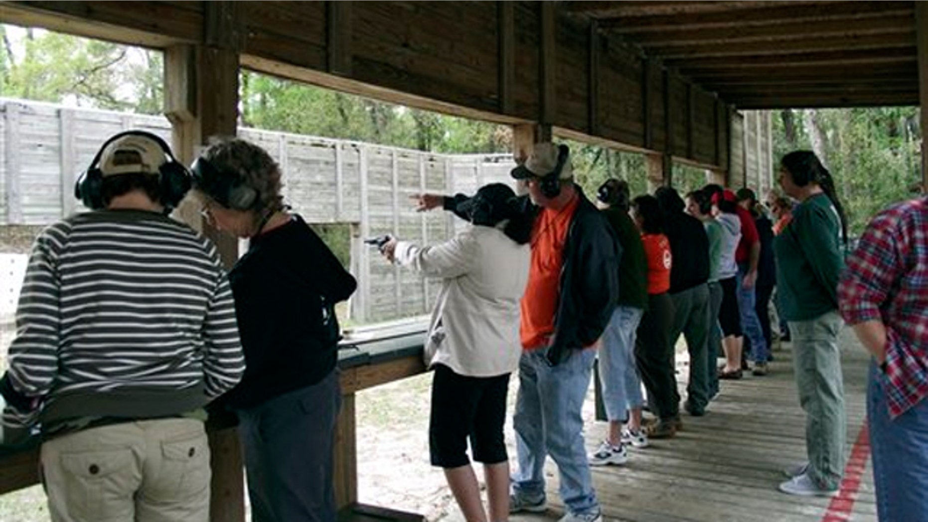 March, 2012: The Florida Fish and Wildlife Conservation Commission shows participants in a "Becoming an Outdoors-Woman" workshop learning handgun shooting skills at the Ocala Conservation Center and Youth Camp in Ocala National Forest, Florida.