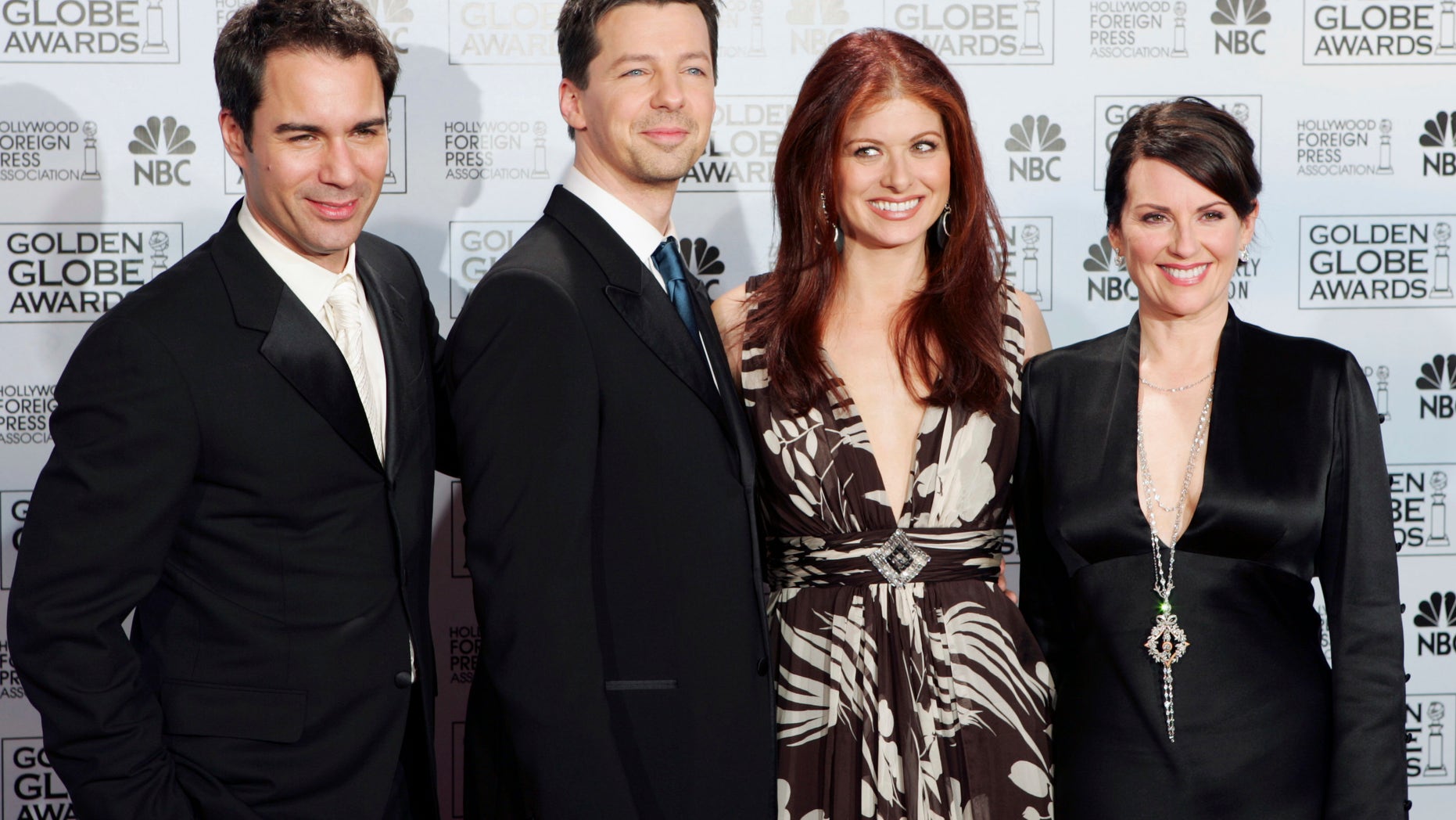 In this Jan. 16, 2006 file photo, cast members from the comedy series "Will & Grace," from left, Eric McCormack, Sean Hayes, Debra Messing and Megan Mullally, pose backstage after making an award presentation at the 63rd Annual Golden Globe Awards in Beverly Hills, Calif.