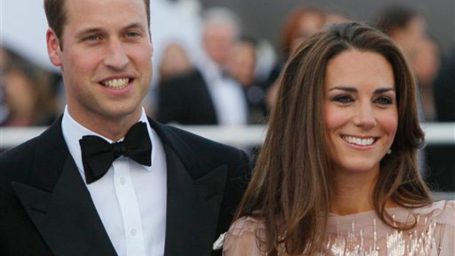 Prince William and his wife Kate, Duchess of Cambridge arrive at a charity event for Absolute Return for Kids, ARK, in central London, Thursday, June, 9, 2011. The charity event is the first official engagement for the couple since they were married on April 29.(AP Photo/Alastair Grant)