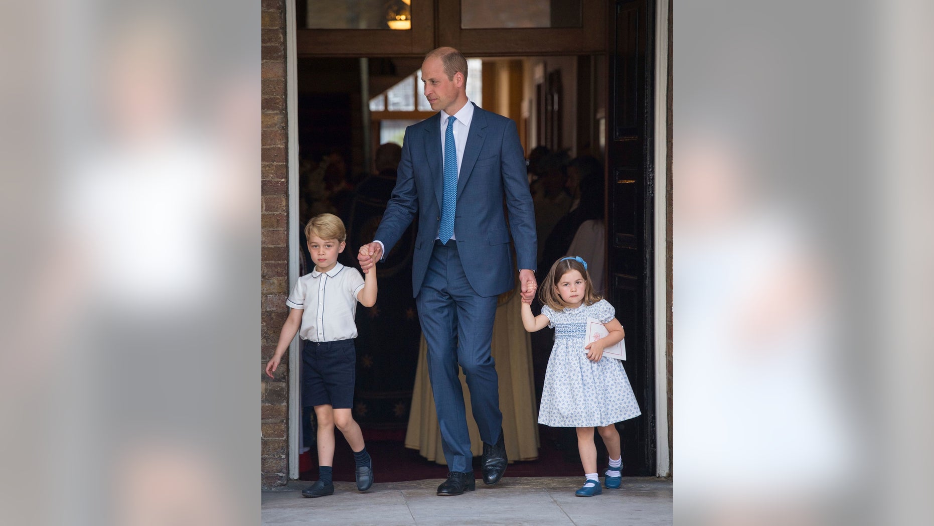 Britain's Prince William with his children Prince George and Princess Charlotte leave after the christening service of Prince Louis at the Chapel Royal, St James's Palace, London, Monday, July 9, 2018. (Dominic Lipinski/Pool Photo via AP)
