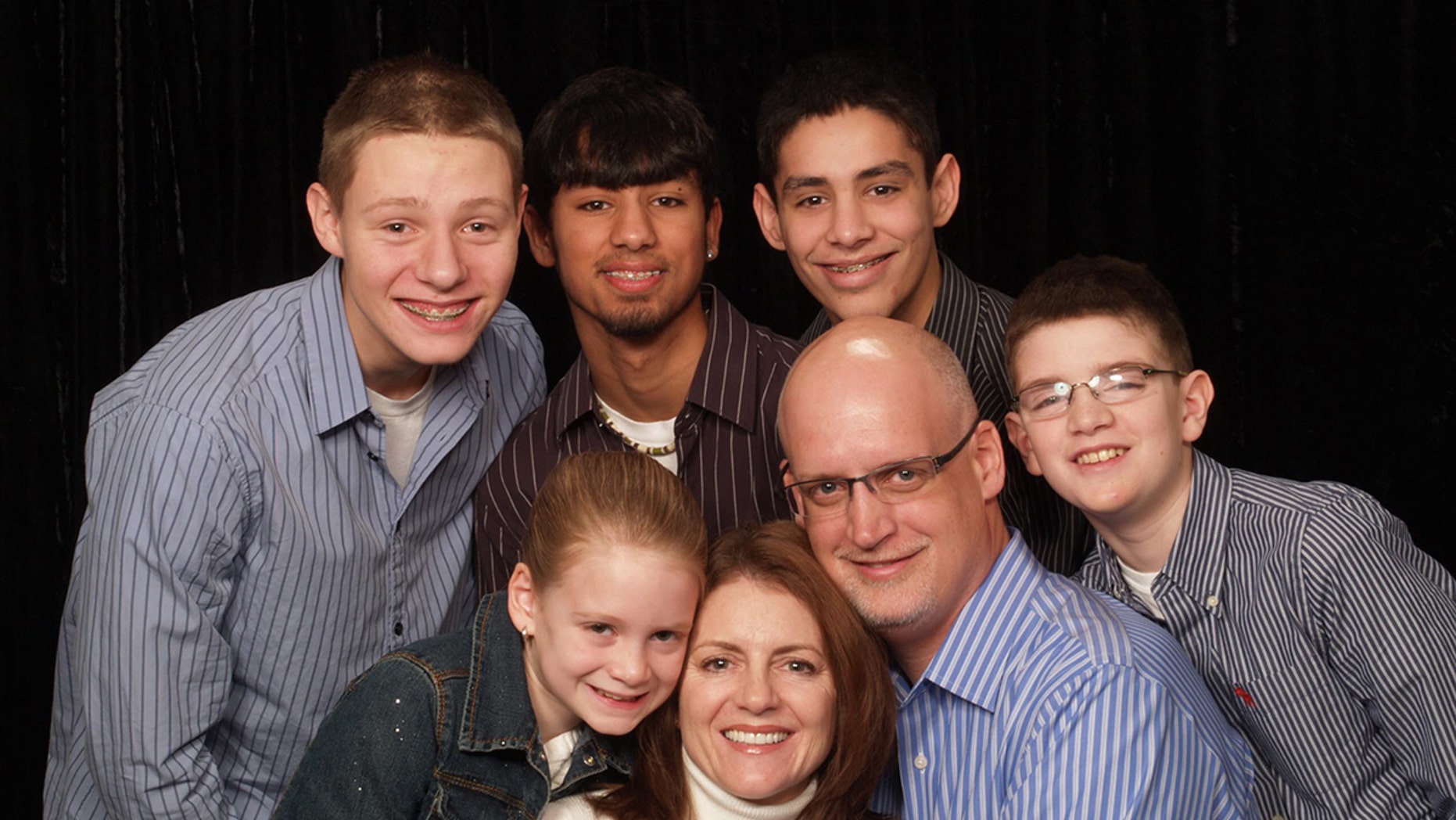 Kevin Williamson with his wife, Marcia, and their five children: Aidan, 20, Seth 18, who are adopted, Riley, 18, Mitch, 15, and Ainsley, 11.