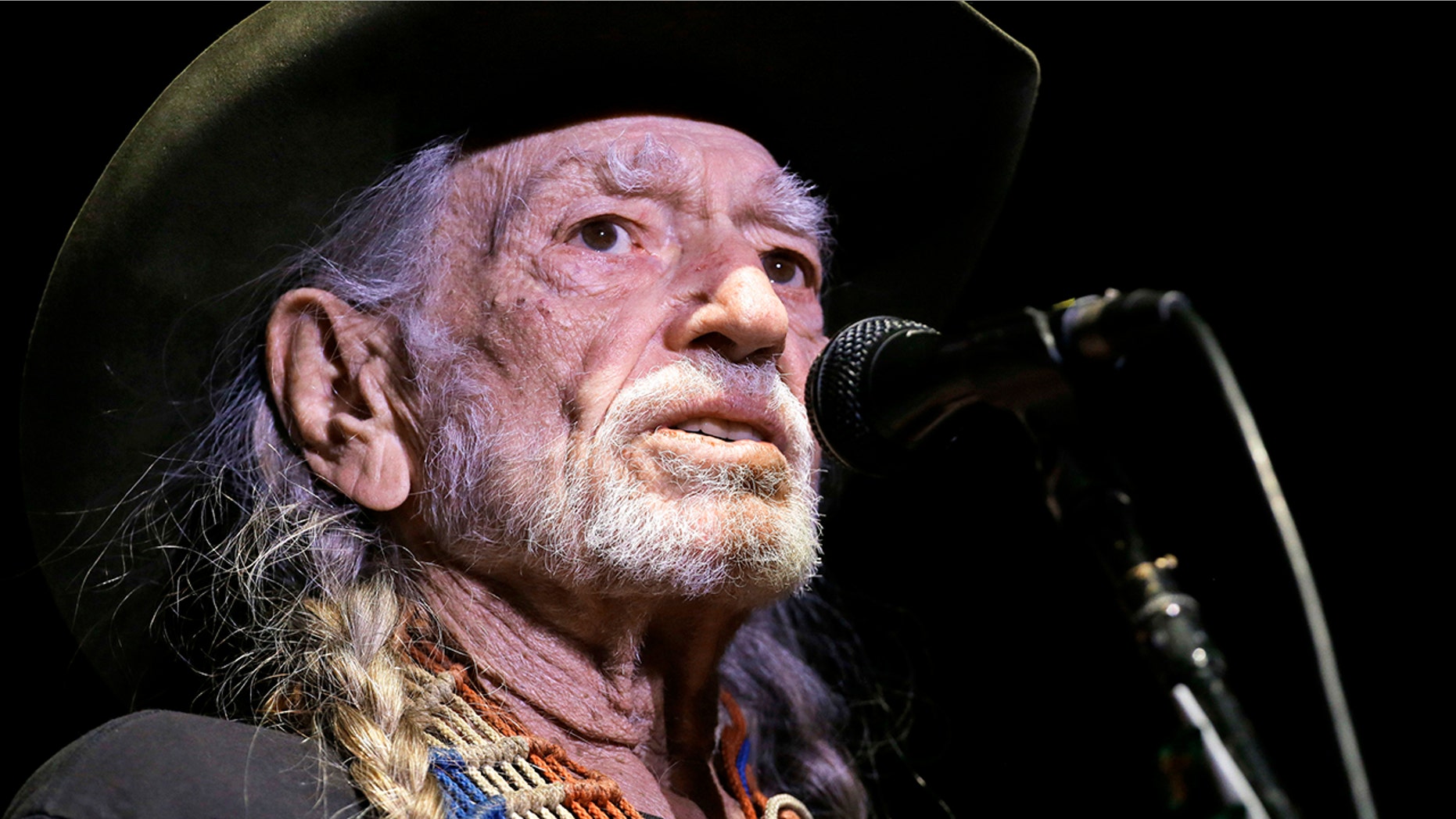 Willie Nelson, here in a January 2017 photo, keeps up a rigorous touring and recording schedule. He is 84 years old.