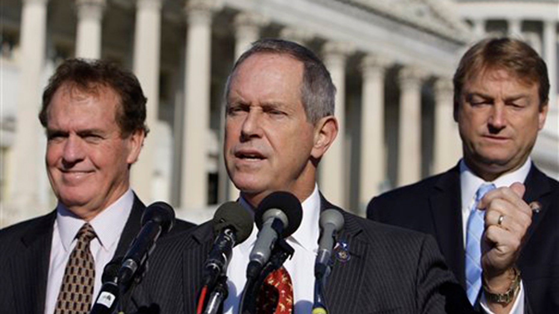 Rep. Joe Wilson, R-S.C., center, speaks about health care reform Nov. 4 in Washington, by Rep. Phil Gingrey, R-Ga., right, and Rep. Dean Heller, R-Nev. (AP Photo)