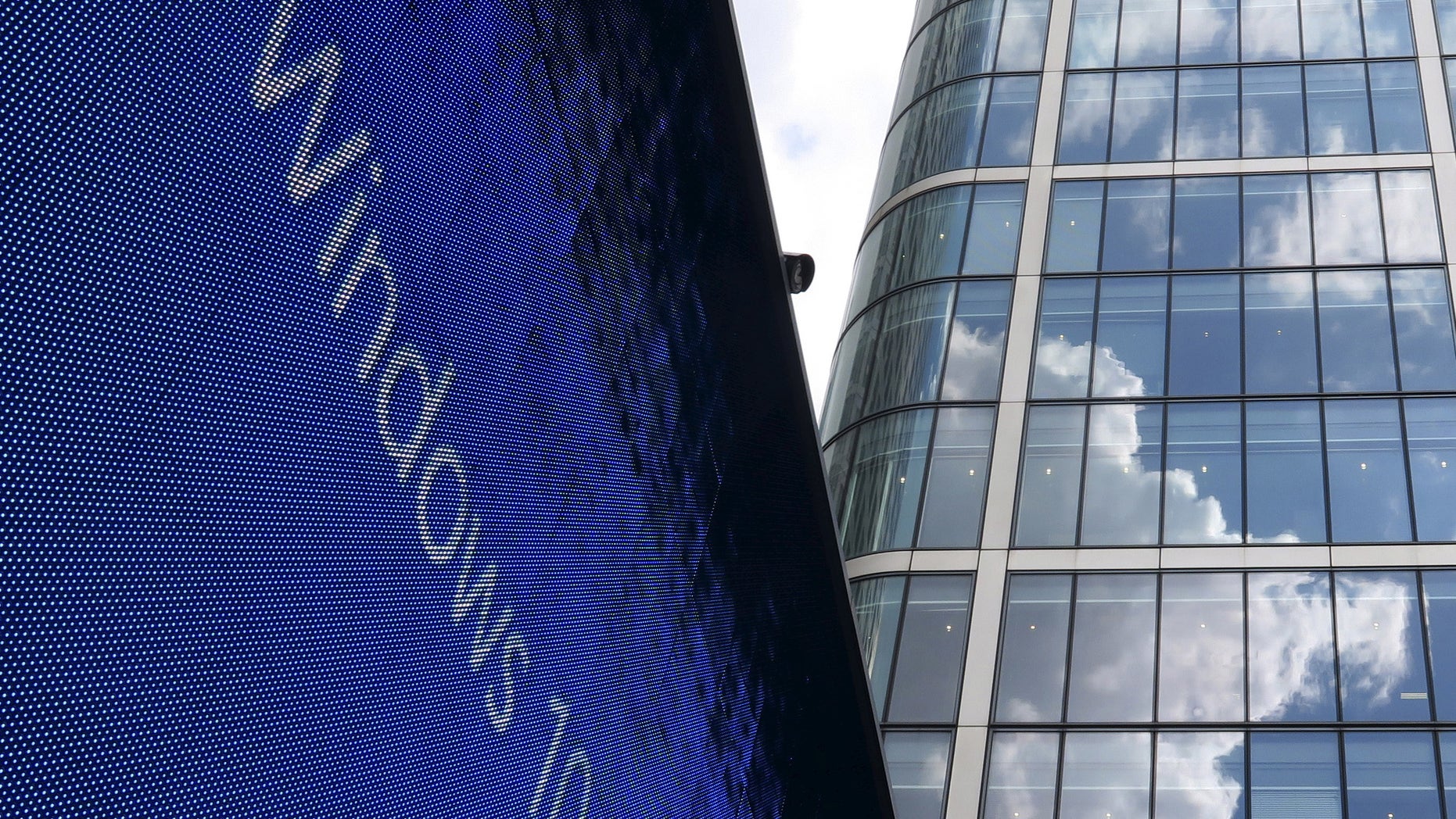 An advertisement for Windows 10 is seen in London's Canary Wharf financial district July 29, 2015.