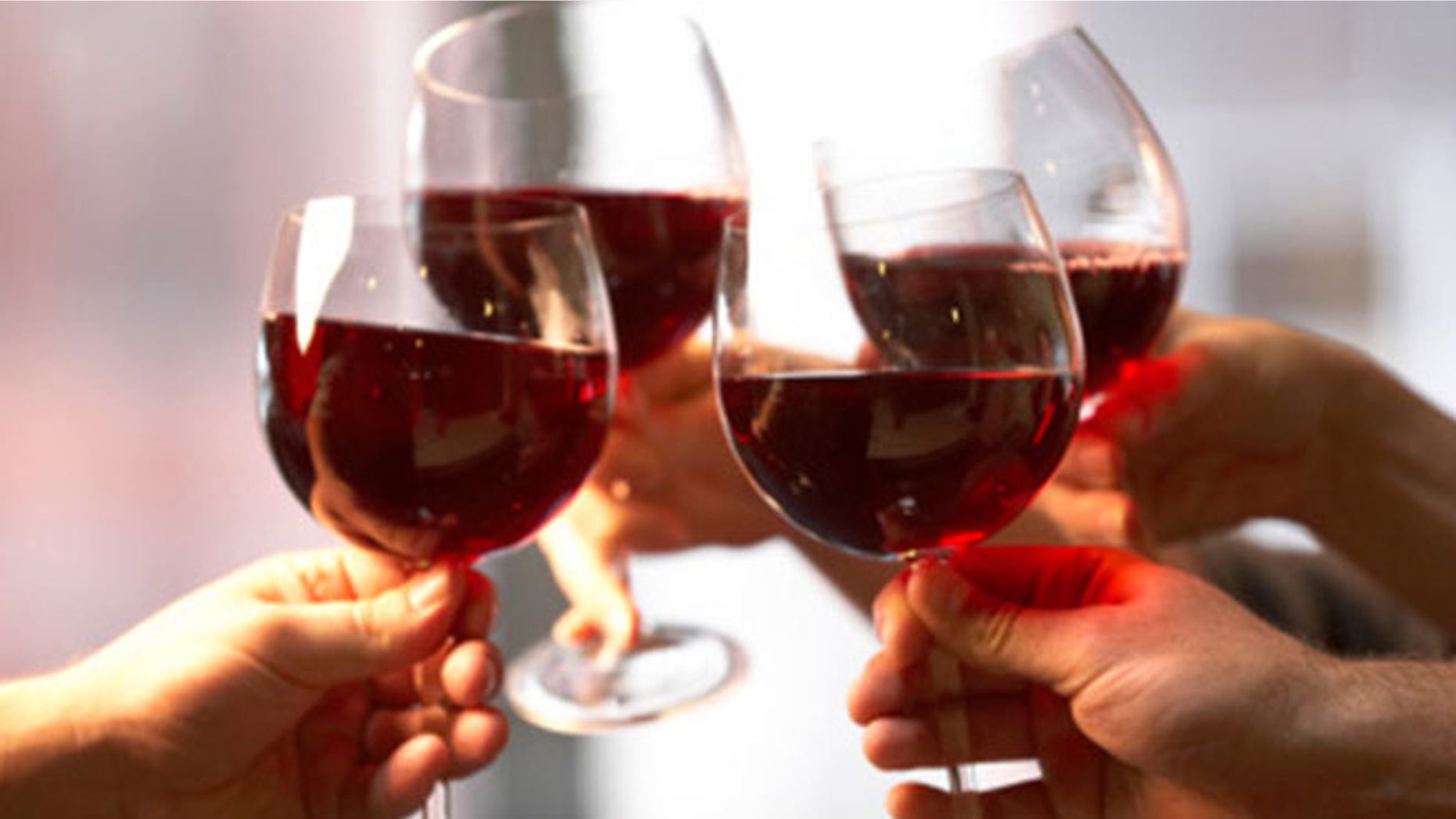 Holding a glass the right way prevents your body heat from warming the wine.