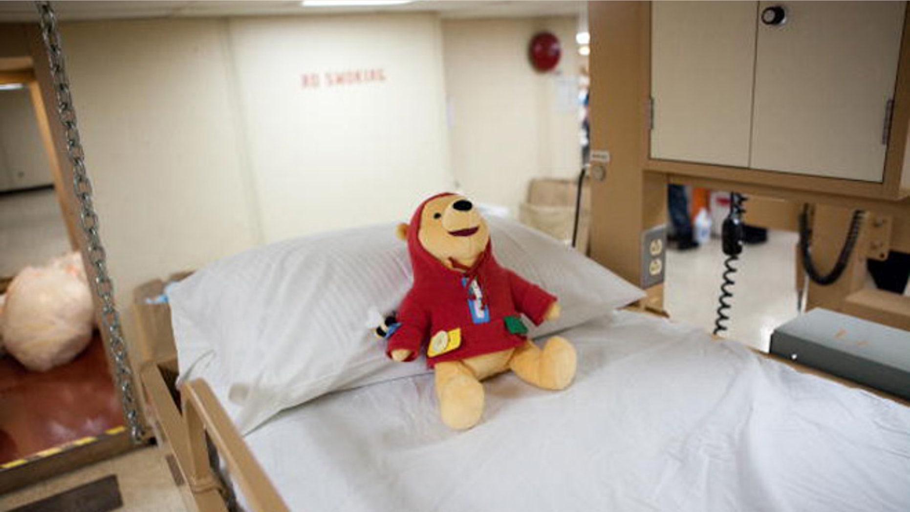 PORT-AU-PRINCE, HAITI - JANUARY 21: A Winnie the Pooh doll awaits patients in the pediatric ward on board the USNS Comfort, a U.S. Naval hospital ship, on January 21, 2010 in Port-au-Prince, Haiti. The Comfort deployed from Baltimore with 550 medical personnel on board to treat victims of Haiti's recent earthquake, and arrived on January 20. (Photo by Brendan Hoffman/Getty Images)