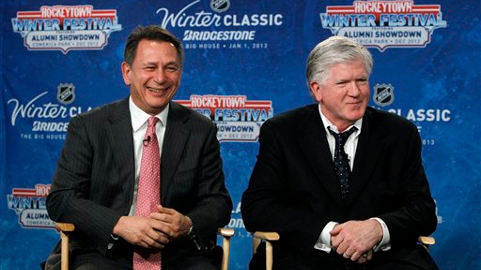 Feb. 9, 2012: Detroit Red Wings general manager Ken Holland, left, and Toronto Maple Leafs President & General Manager Brian Burke speak at a news conference to announce the NHL Winter Classic hockey game at Comerica Park in Detroit. The Toronto Maple Leafs will play the Detroit Red Wings at Michigan Stadium in Ann Arbor, Mich., on Jan. 1, 2013.