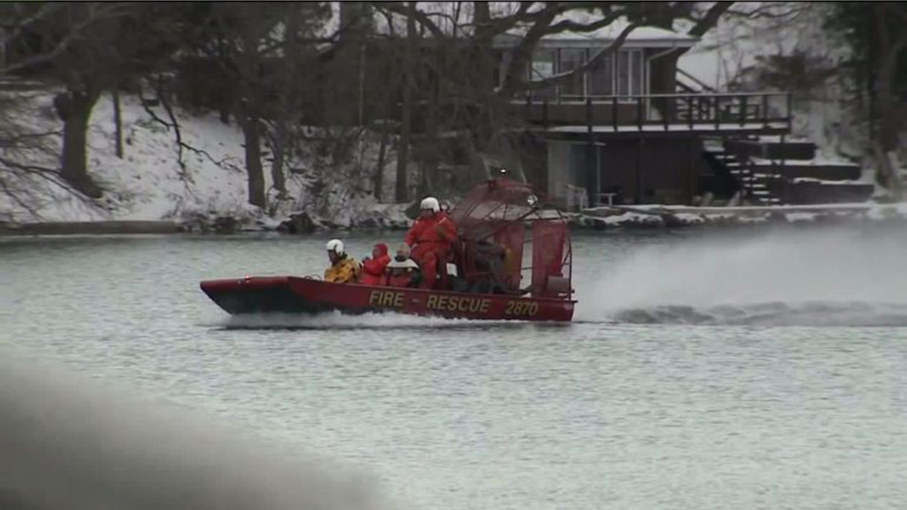 Jan. 3, 2016: A search crew looks for two missing men on Lake Beulah, in East Troy, Wis. The bodies of two other men were pulled from the lake Sunday. (WITI)