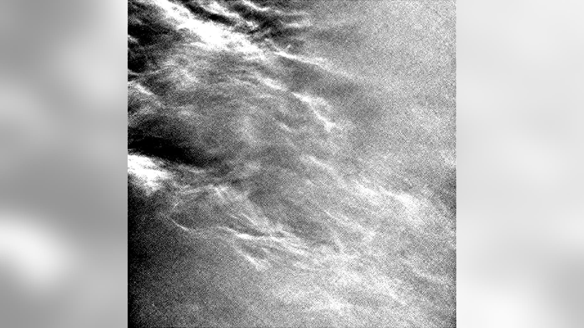 Wispy clouds streaking across Mars' sky, as imaged by the Curiosity rover.