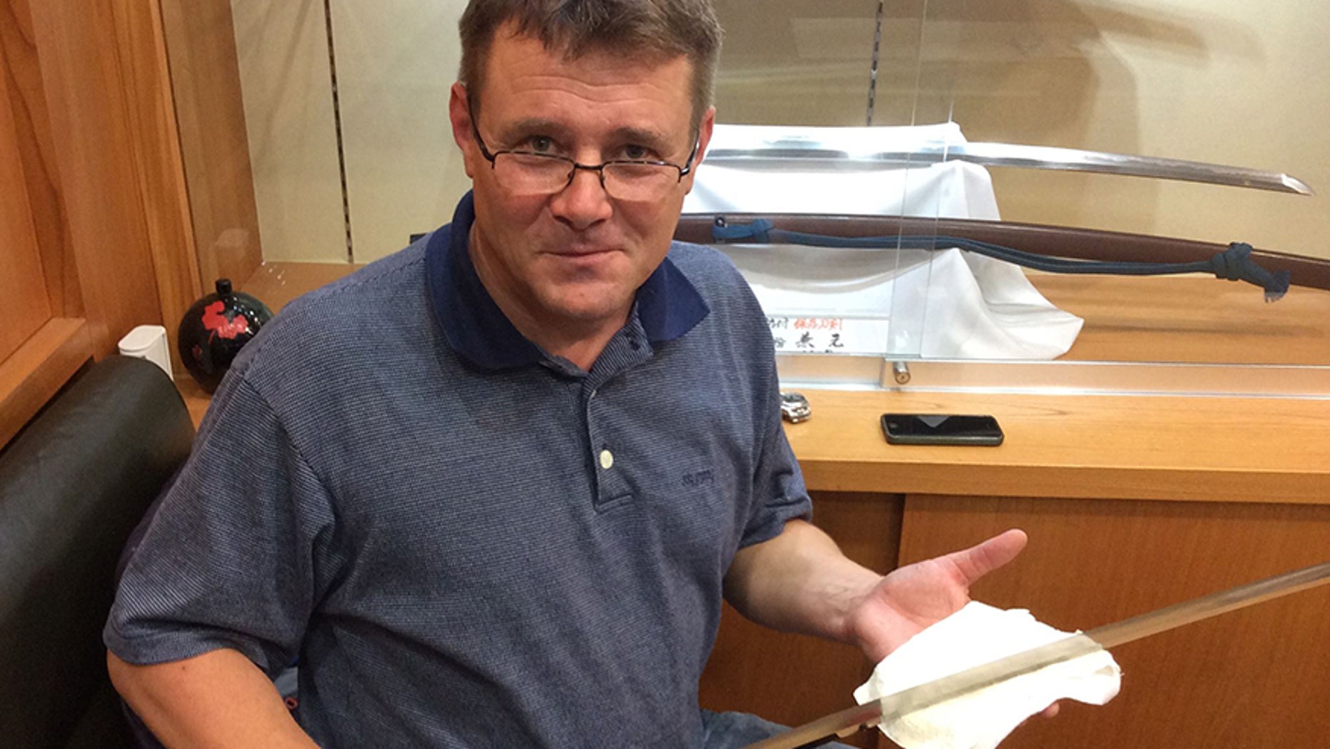 A Welsh samurai sword expert took his own life, officials said.