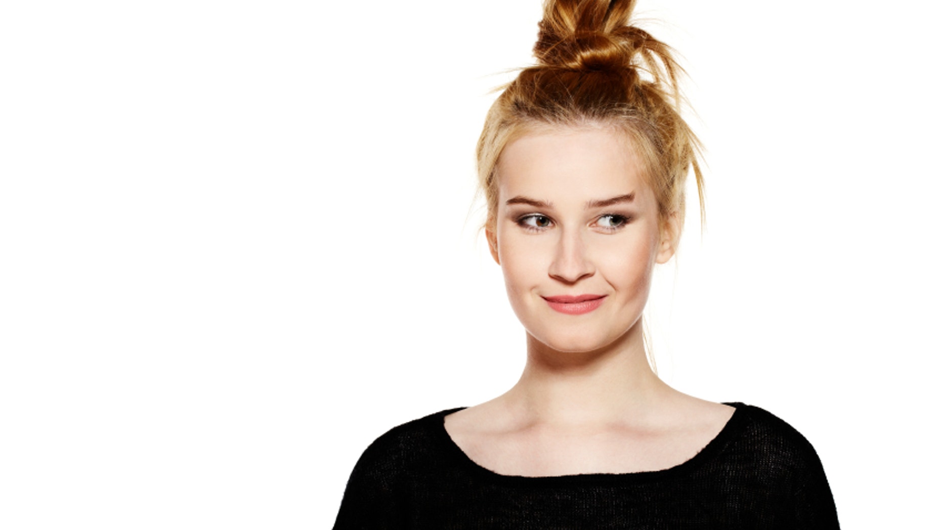 Portrait of attractive young woman isolated on white background.