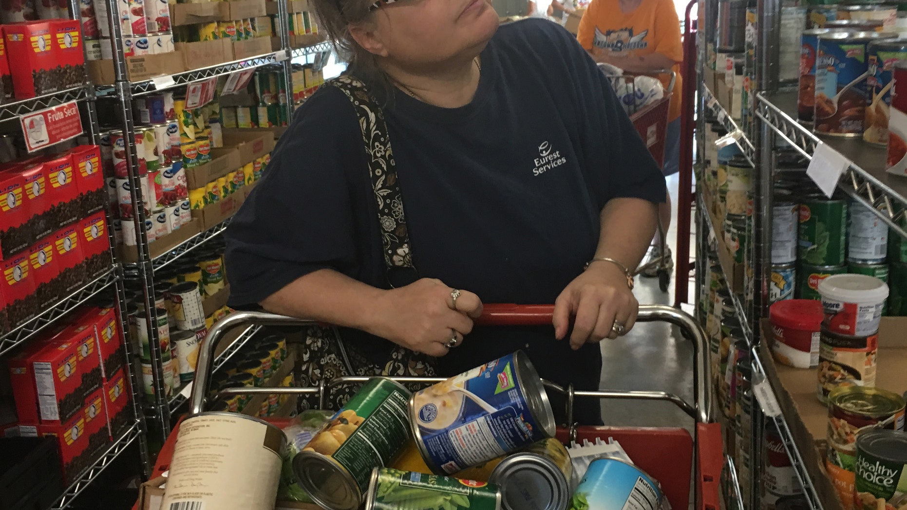 In this photo provided by Adam Allington, taken June 18, 2016, shows Margaret Anderson. During their working years, women tend to earn less than men, and when they retire, they're more likely to live in poverty. (Adam Allington via AP)