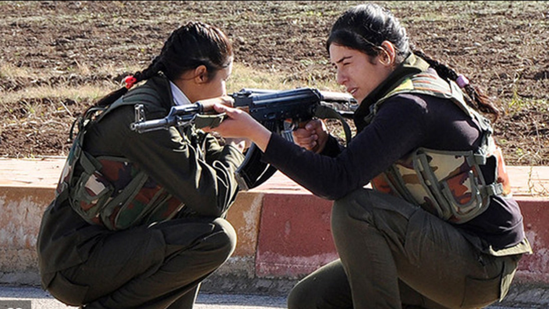 Female fighters like these Kurdish women are being joined by Syriac Christian women in the fight against ISIS. (Reuters)