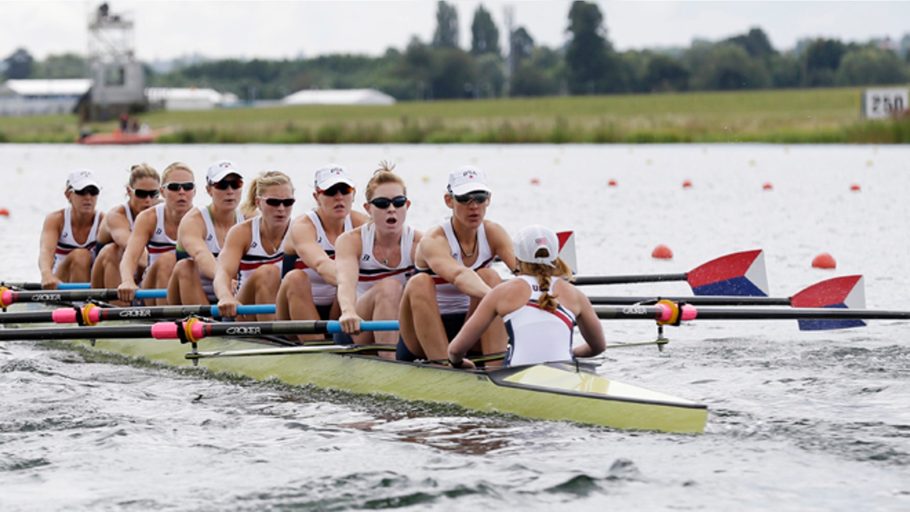 July 29, 2012: U.S. rowers, from right, Mary Whipple, Caryn Davies, Caroline Lind, Eleanor Logan, Meghan Musnicki, Taylor Ritzel, Esther Lofgren, Zsuzsanna Francia, and Erin Cafaro stroke during a women's rowing eight heat in Eton Dorney, near Windsor, England, at the 2012 Summer Olympics.