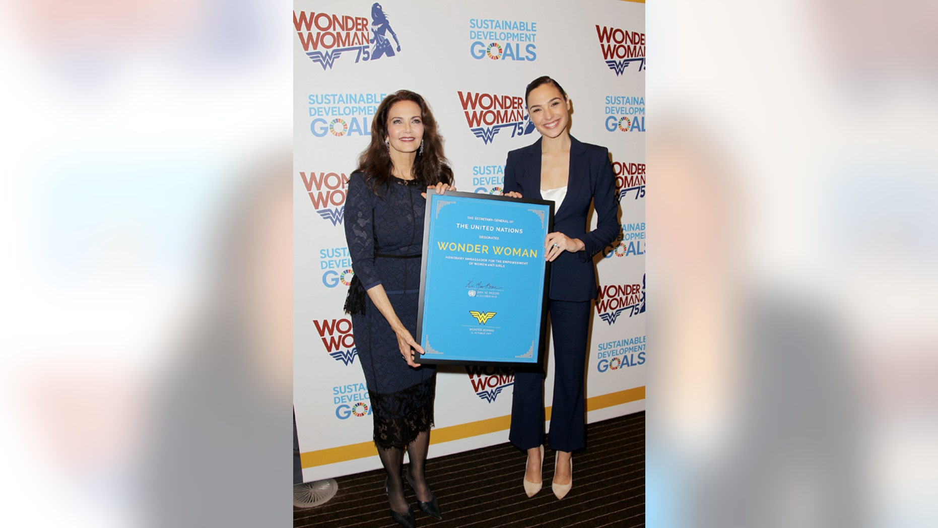 Oct. 21, 2016: Actress Lynda Carter, who starred in the 1970s series,"Wonder Woman," left, and actress Gal Gadot, who stars in the upcoming film, "Wonder Woman," appear at a United Nations event naming the superhero character as an Honorary Ambassador For the Empowerment of Women and Girls