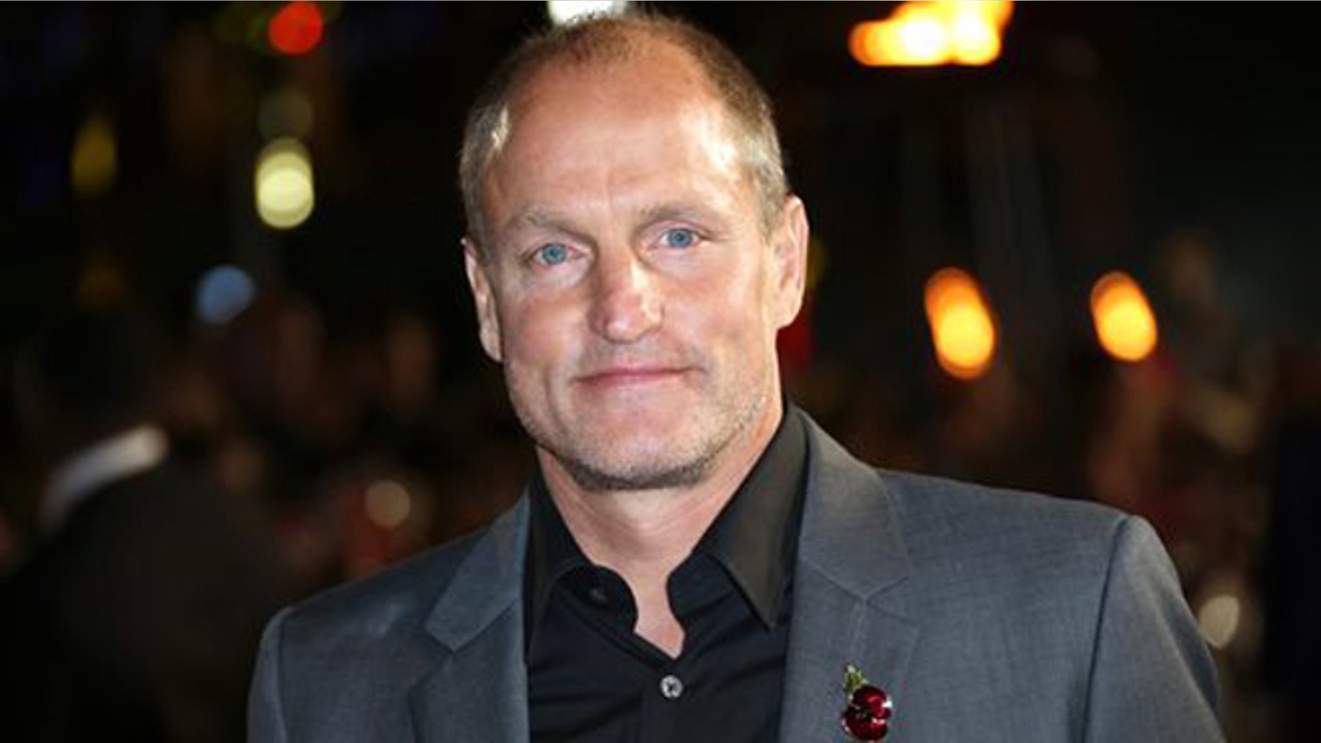This Nov. 5, 2015 photo shows Woody Harrelson at premiere of the “The Hunger Games Mockingjay Part 2” film in London. (Photo by Joel Ryan/Invision/AP)