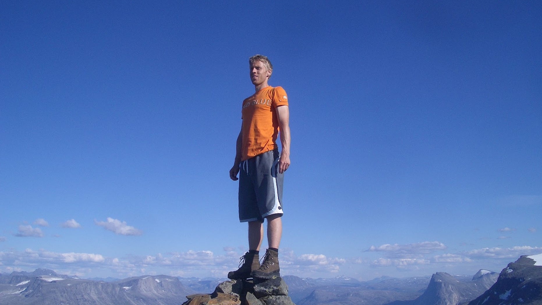 Climbing to the top of a mountain in his native Norway.