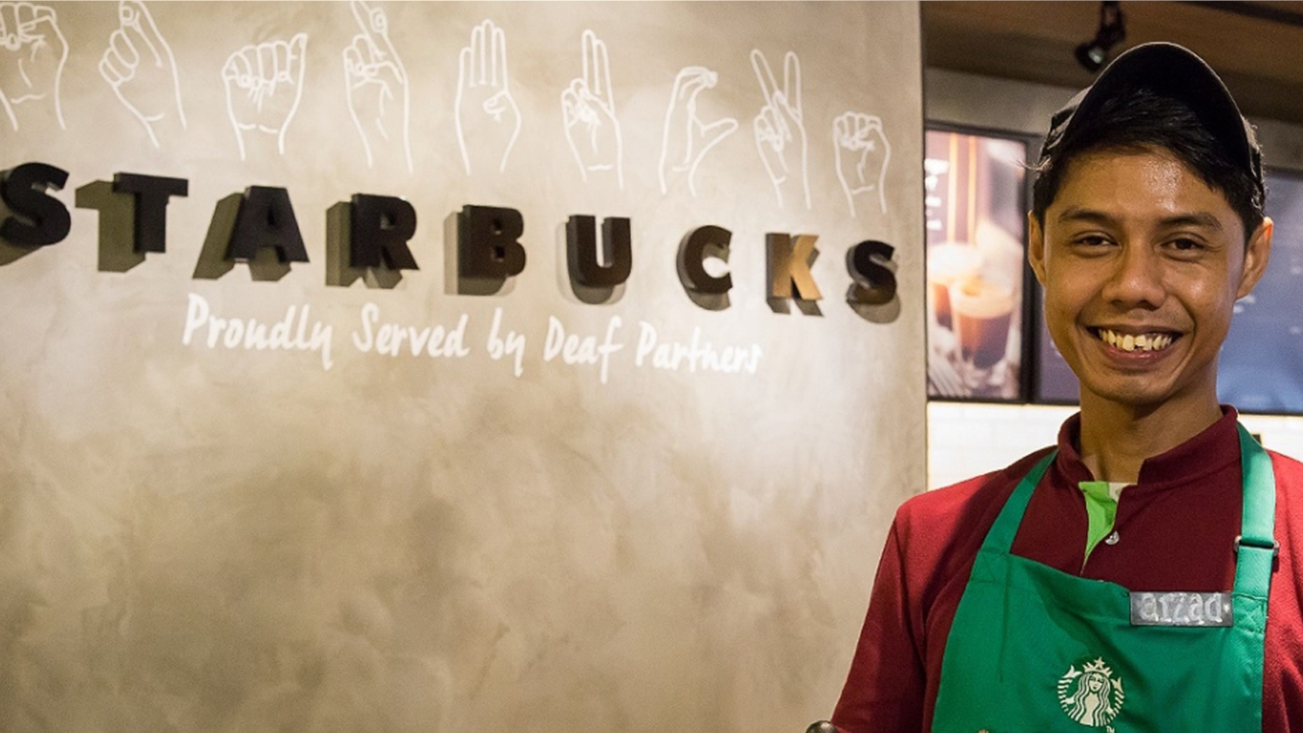 Muhammad Aizad Bin Ariffin, a Deaf store shift manager, has been with the company for three years.