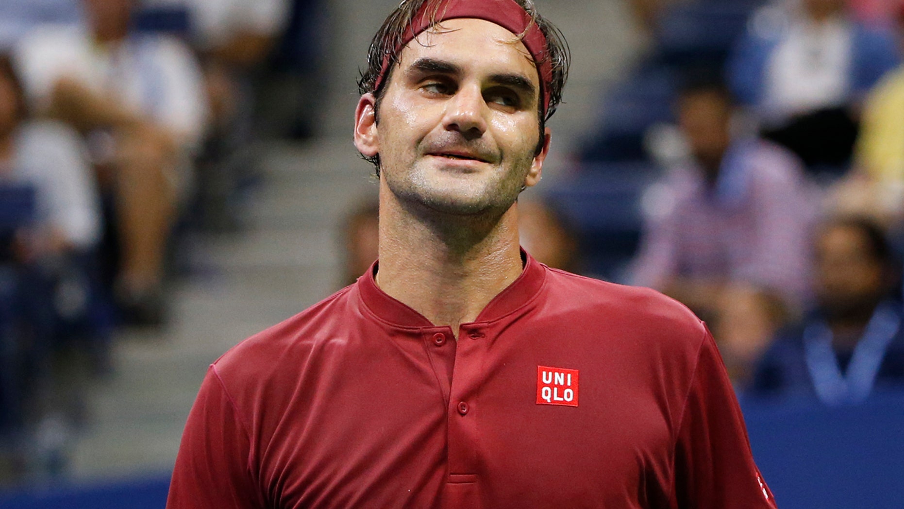 SEPT. 3: Roger Federer, of Switzerland, reacts after losing a point to John Millman, of Australia, during the fourth round of the U.S. Open tennis tournament.