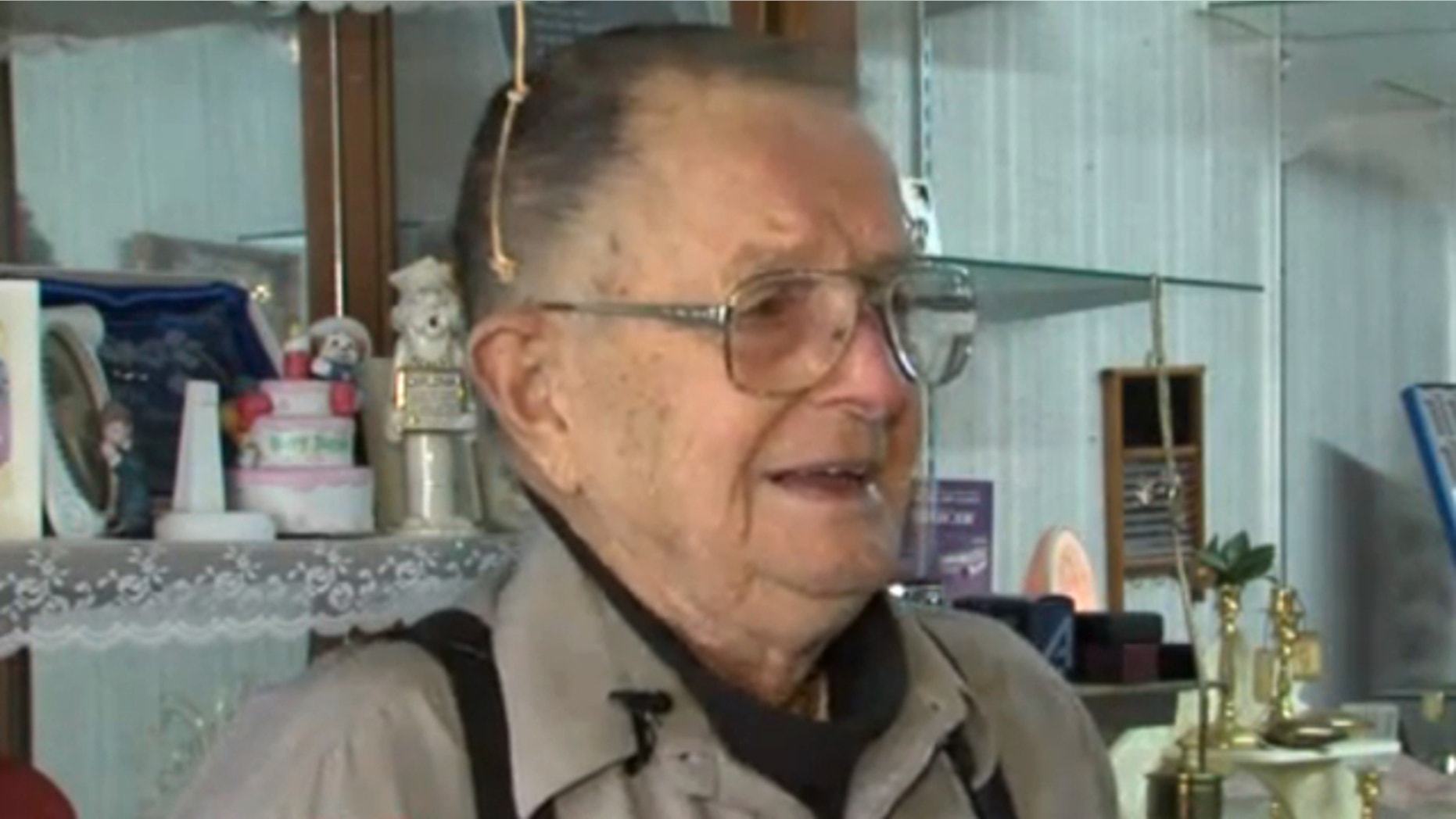 Kenneth Knudson, an 88-year-old World War II veteran, says he was fined and jailed for one night after he failed to produce a plan to fix his office building in downtown Horton, Kan.