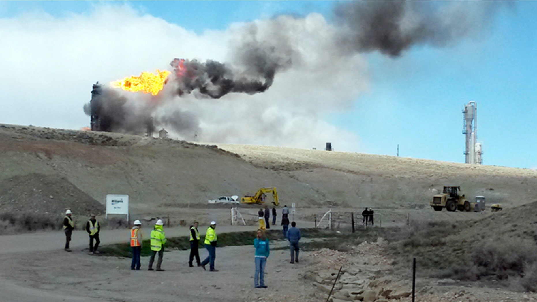 April 23: This image shows officials at the site of an explosion and fire at a natural gas processing facility and major national pipeline hub in Opal, Wyo.