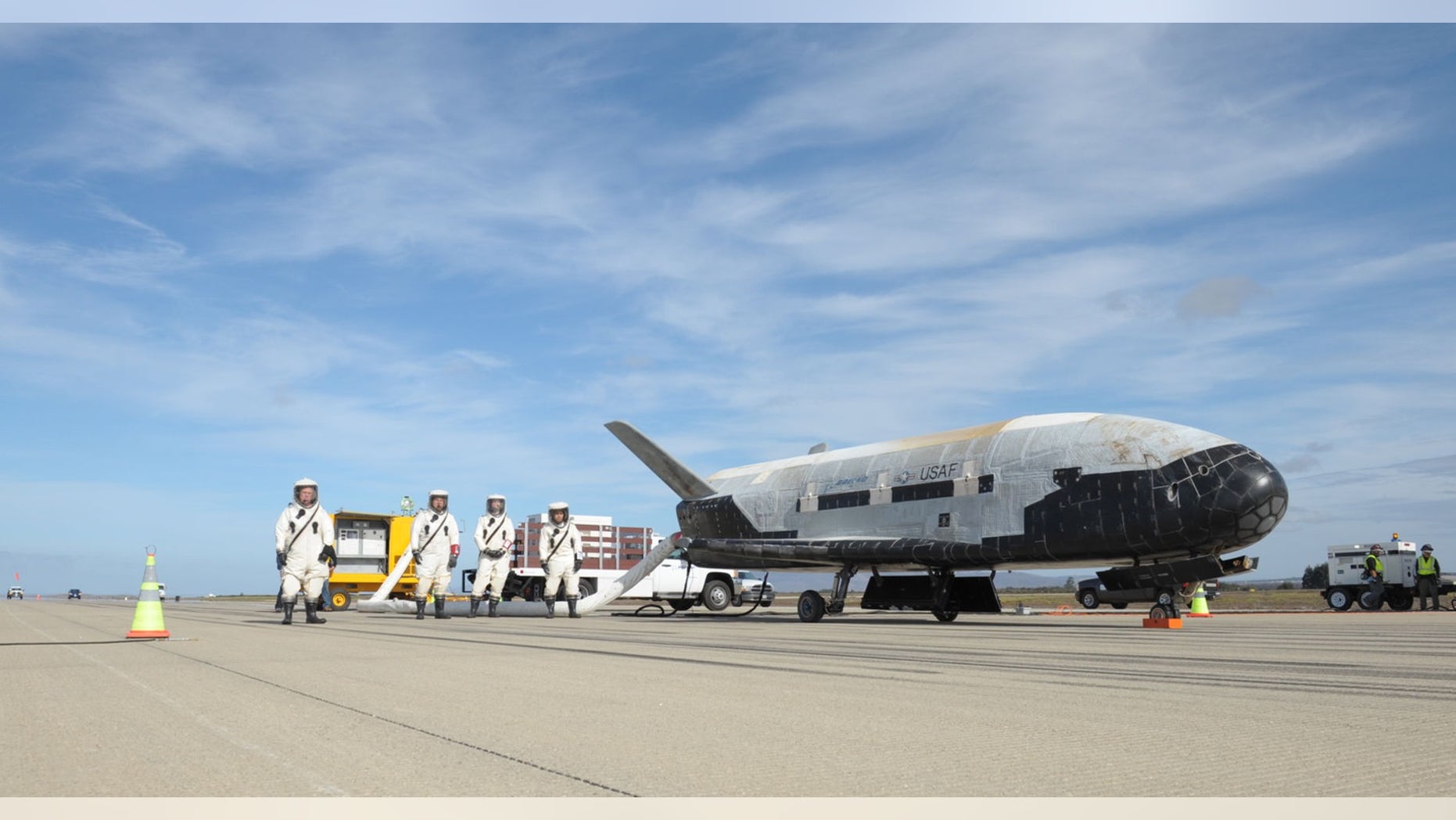 One of the U.S. Air Force's robotic X-37B space planes is seen on the runway after landing itself following a classified mission. The fifth X-37B mission, called Orbital Test Vehicle 5, will launch Sept. 7, 2017, from Florida's Cape Canaveral Air Force Station atop an Atlas V rocket.