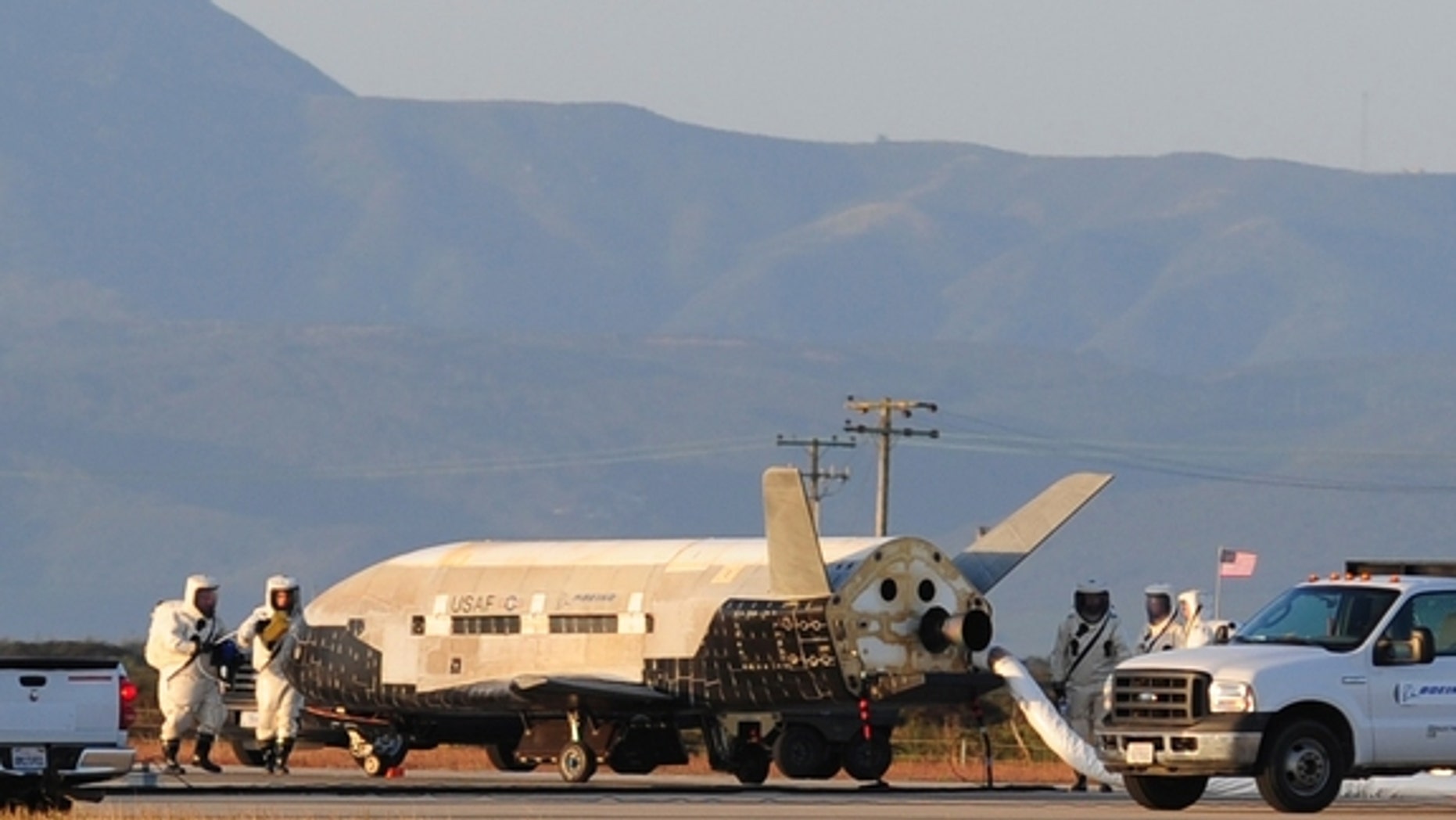 The X-37B Orbital Test Vehicle (OTV), the Air Force's unmanned, reusable space plane, landed at Vandenberg Air Force Base at 5:48 a.m. (PDT) June 16. OTV-2, which launched from Cape Canaveral Air Force Station, Fla., March 5, 2011, conducted on-orbit experiments for 469 days during its mission. The X-37B is the newest and most advanced re-entry spacecraft. Managed by the Air Force Rapid Capabilities Office, the X-37B program performs risk reduction, experimentation and concept of operations development for reusable space vehicle technologies. (photo credit: Boeing)
