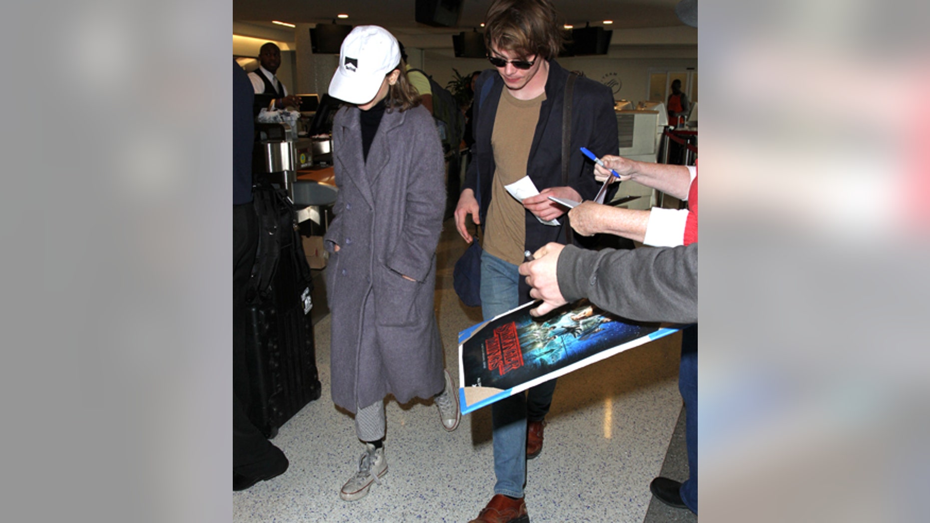 Natalia Dyer and Charlie Heaton leave Los Angeles after attending the Golden Globe Awards