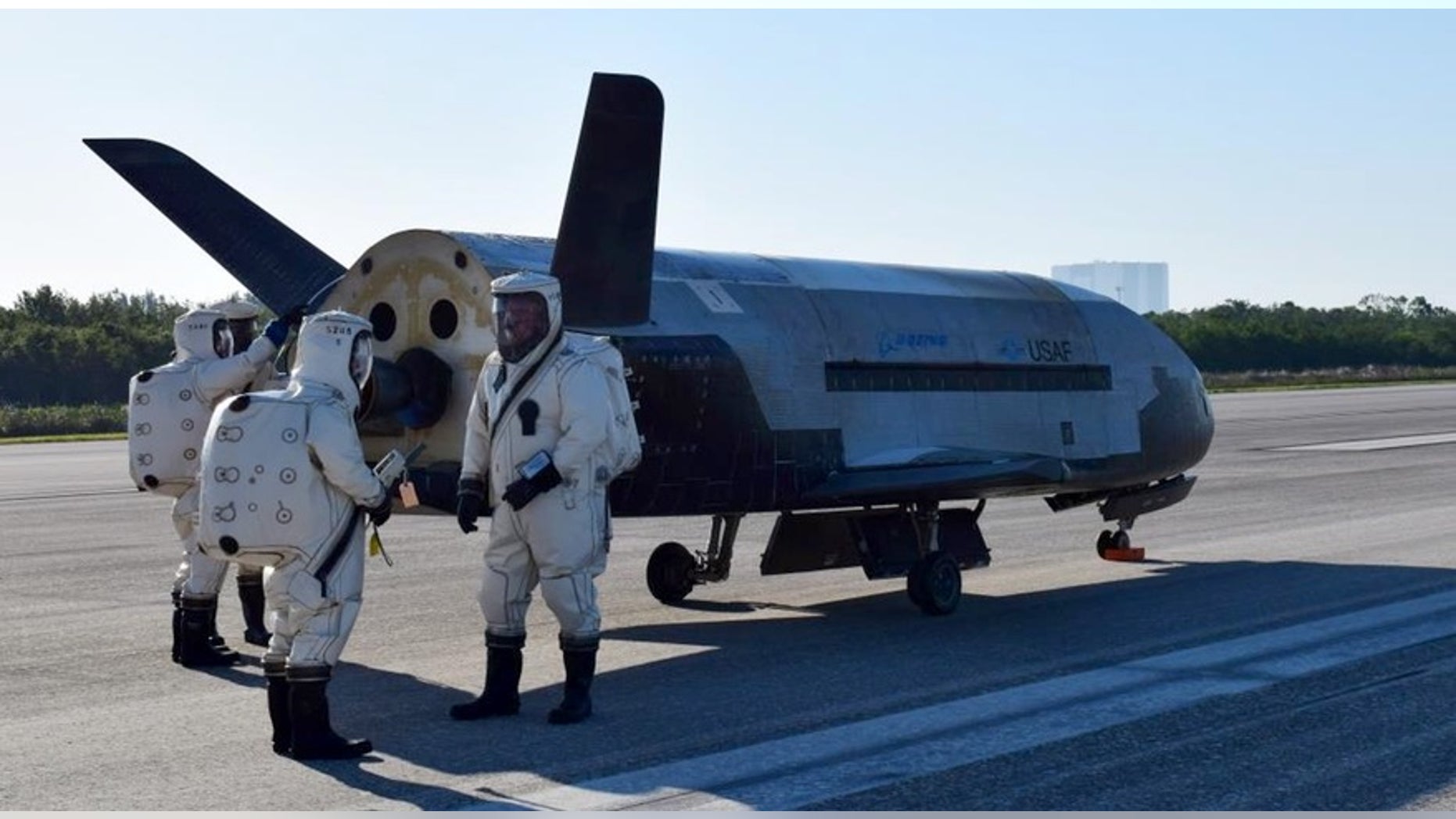 The U.S. Air Force's robotic X-37B space plane sits on the Shuttle Landing Facility runway at NASA's Kennedy Space Center shortly after a May 7, 2017, landing that ended the 718-day OTV-4 mission.