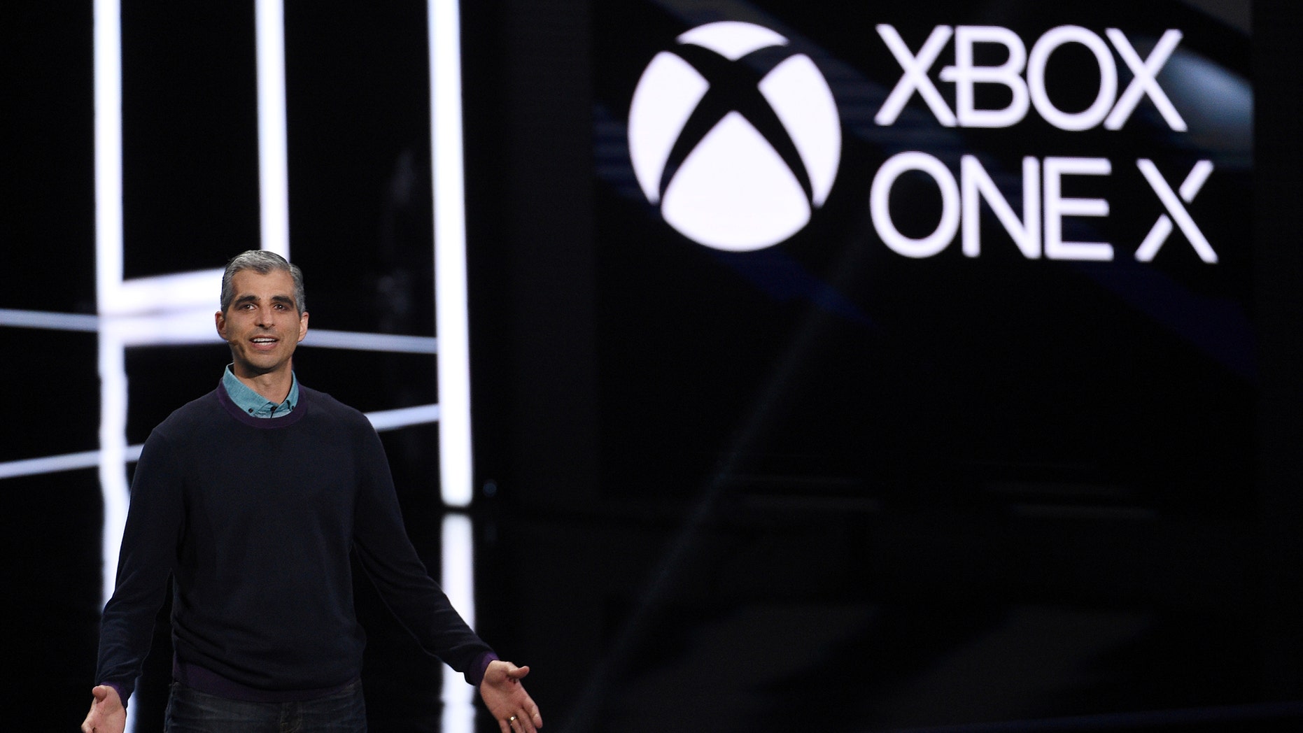 Kareem Choudhry, Xbox Vice President, introduces the Xbox One X gaming console during the Xbox E3 2017 media briefing in Los Angeles, California, U.S., June 11, 2017. (REUTERS/Kevork Djansezian)