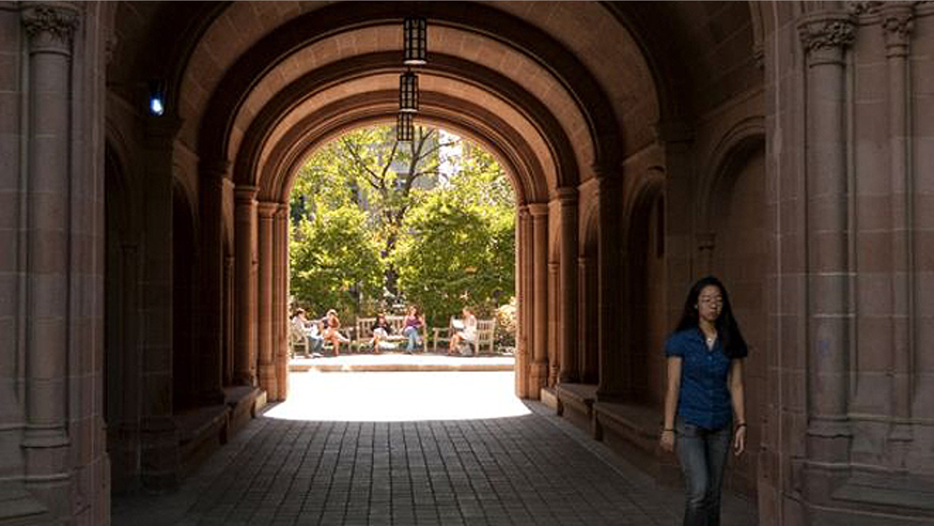 A student at Yale University walks on campus in 2009. Yale officials told FoxNews.com the university is currently considering to cover gender reassignment surgery in its health insurance coverage for students. (AP)