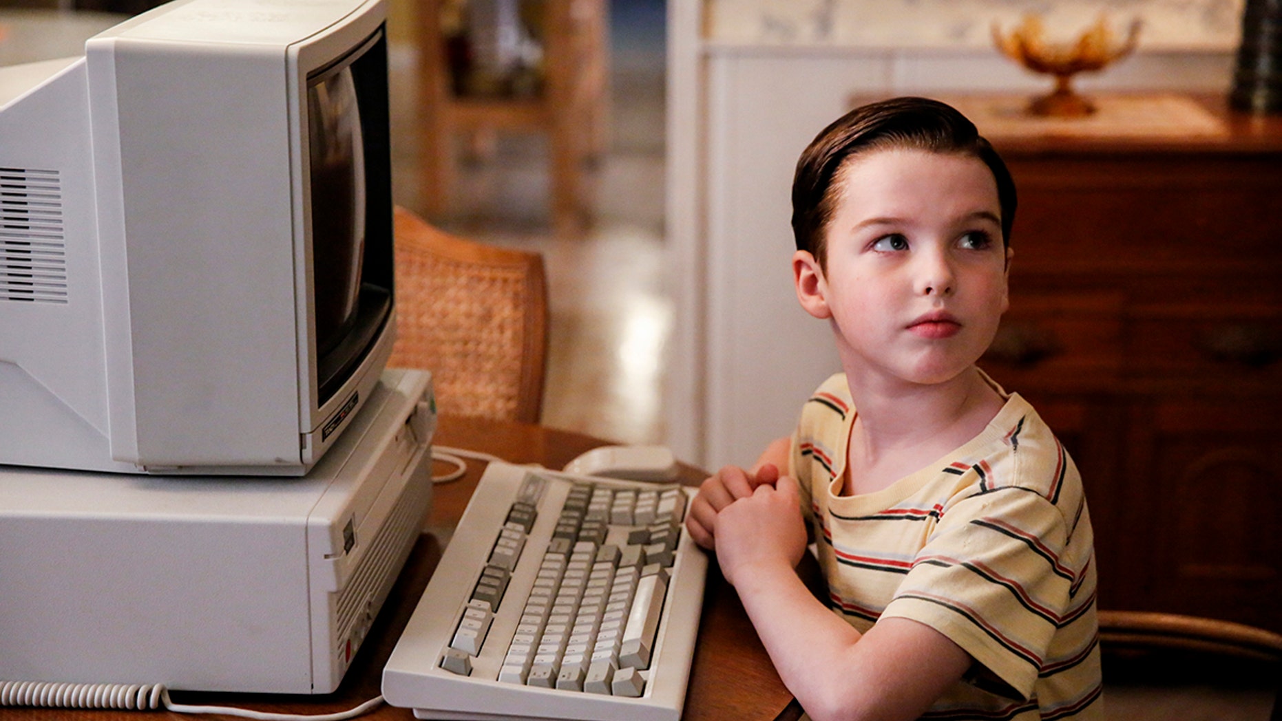 "A Computer, a Plastic Pony, and a Case of Beer" -- Pictured: Sheldon (Iain Armitage). Sheldon asks for a computer and unknowingly sparks a heated argument between Mary and George Sr. over the family's finances, on YOUNG SHELDON, Thursday, Jan. 18 (8:31-9:01 PM, ET/PT) on the CBS Television Network. Photo: Cliff Lipson/CBS ÃÂé2017 CBS Broadcasting, Inc. All Rights Reserved.