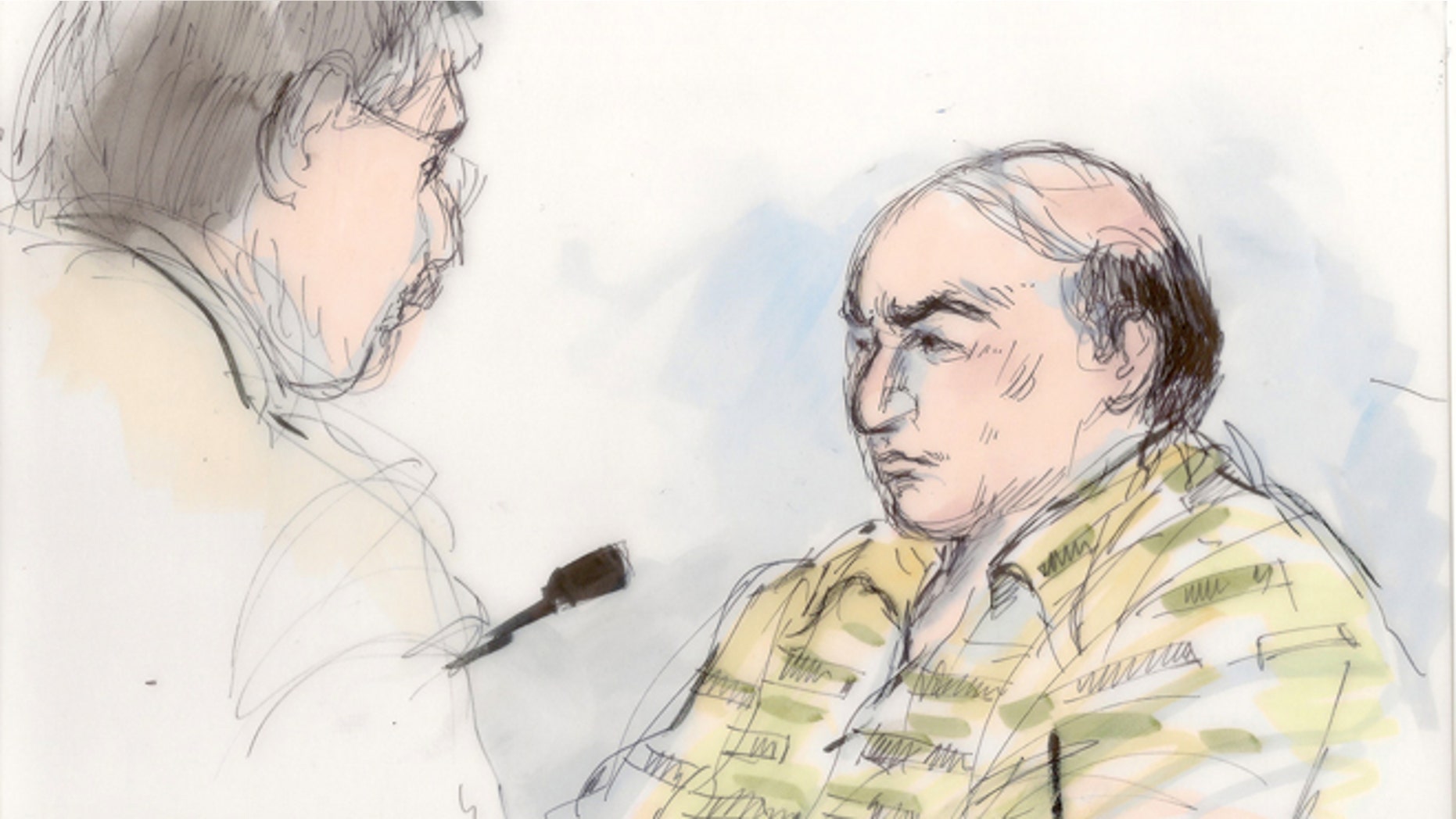 Sept. 27, 2012: This file courtroom sketch shows shows Mark Basseley Youssef talking with his attorney Steven Seiden, left, in court in Los Angeles.