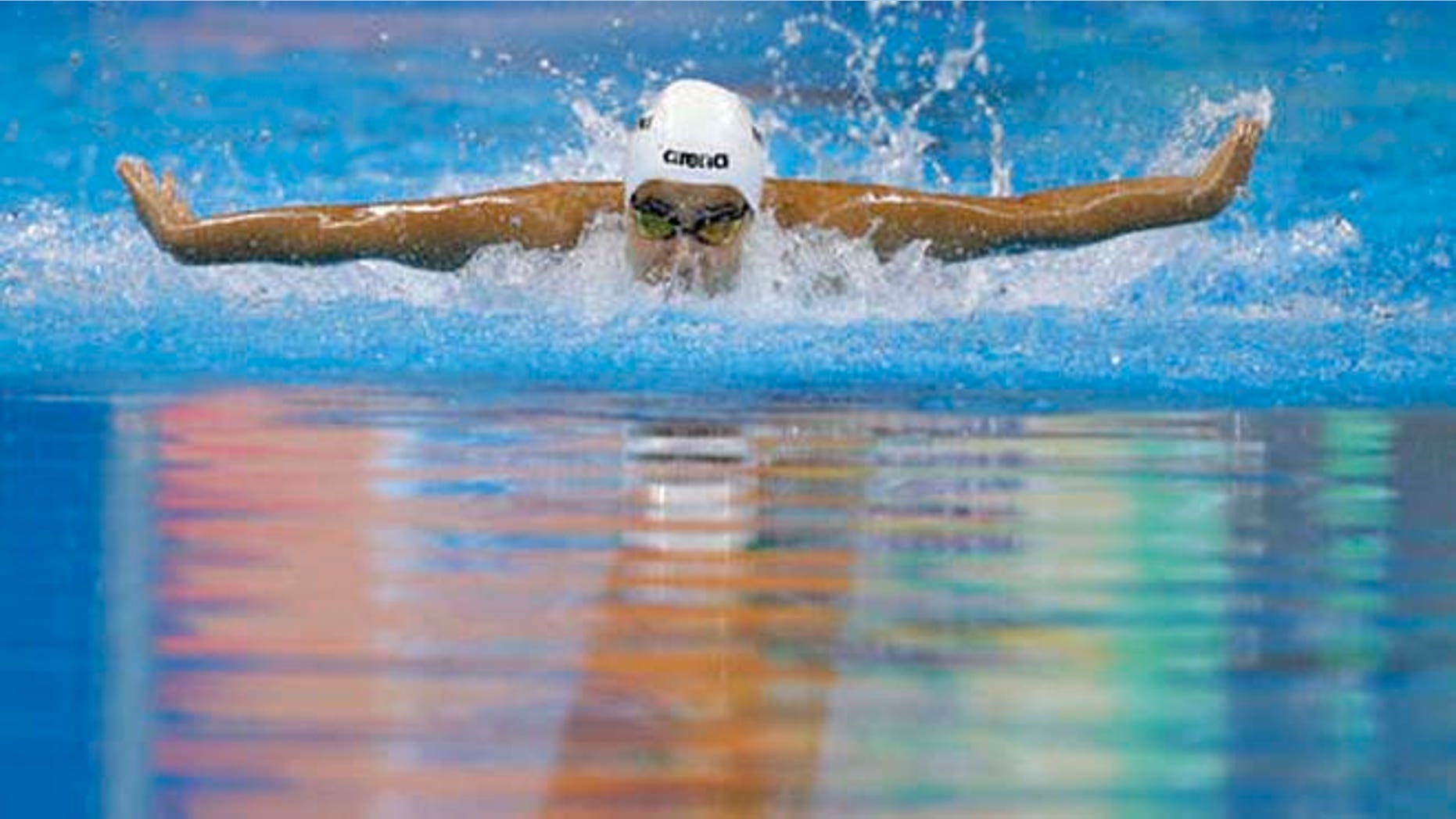 Yusra Mardini, swimming for the Refugee Olympic Team, competes in a women's 100m butterfly heat during the swimming competitions at the 2016 Summer Olympics, Saturday.