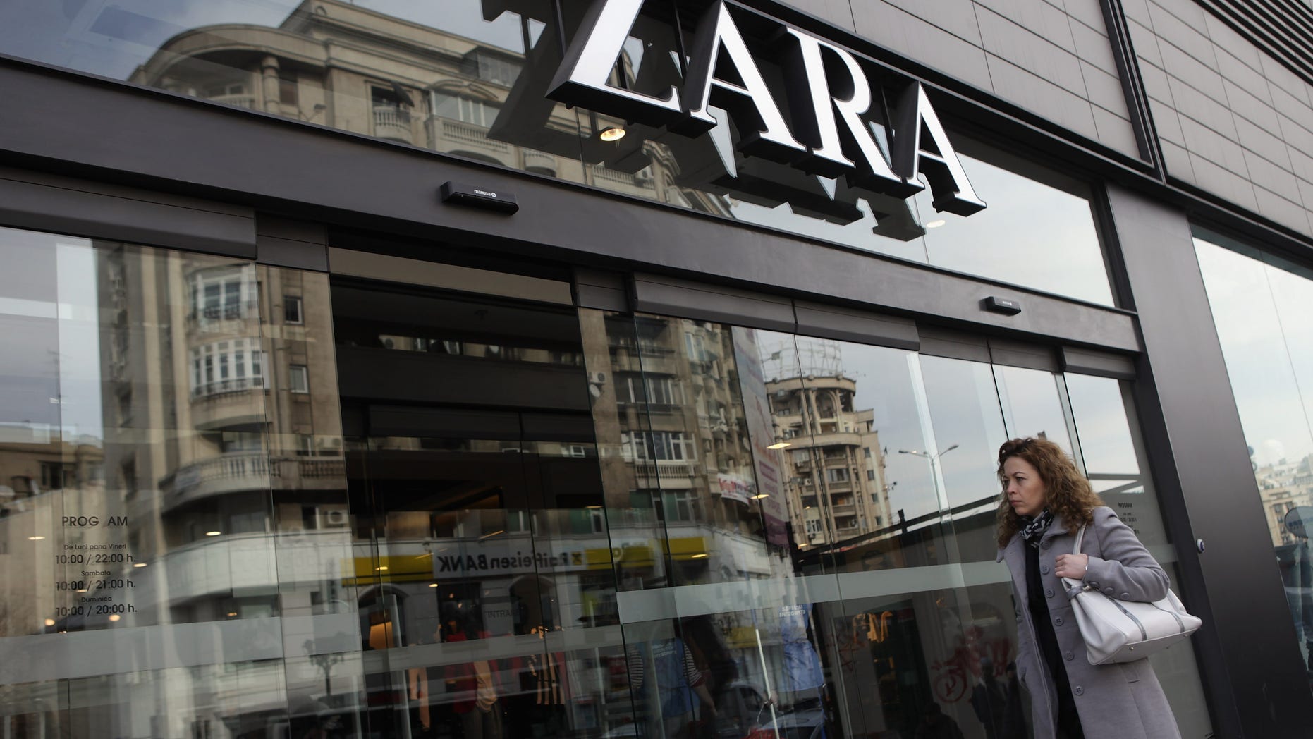 BUCHAREST, ROMANIA - MARCH 08: A woman enters a Zara clothing store on March 8, 2013 in Bucharest, Romania. Both Romania and Bulgaria have been members of the European Union since 2007 and restrictions on their citizens' right to work within the EU are scheduled to end by the conclusion of this year. However, Germany's interior minister announced recently that he would veto the two countries' entry into the Schengen Agreement, which would not affect labour rights but would prevent passport-free travel. (Photo by Sean Gallup/Getty Images)