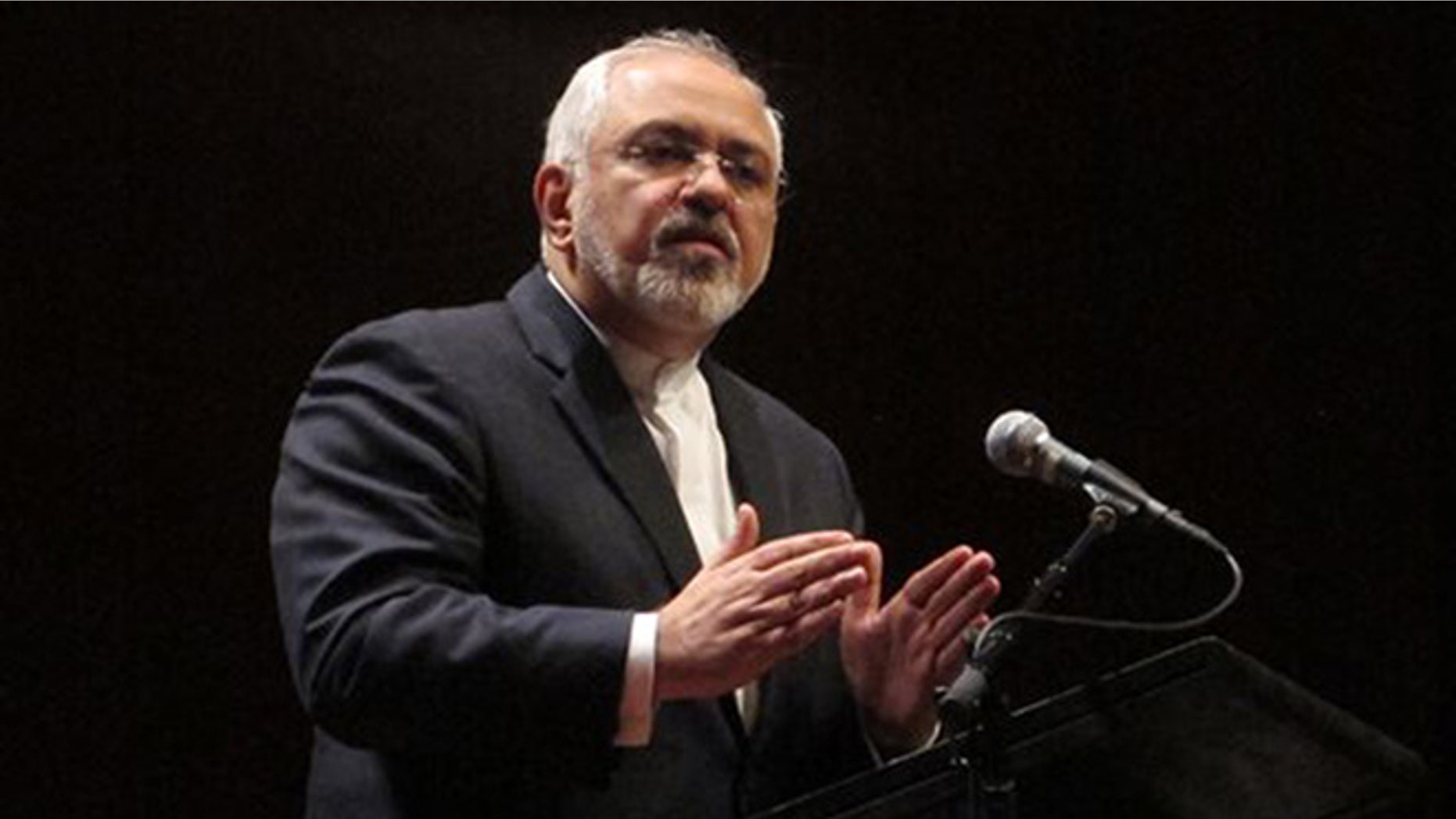 Iran's Foreign Minister Mohammad Javad Zarif gives a speech Tuesday, March 15, 2016, in Canberra, Australia. Zarif said Tuesday that he had deliberately negotiated the wording of the latest United Nations resolution restraining his country's nuclear program to ensure that the test-firing of nuclear-capable Iranian missiles would be legal. (AP Photo/Rod McGuirk)